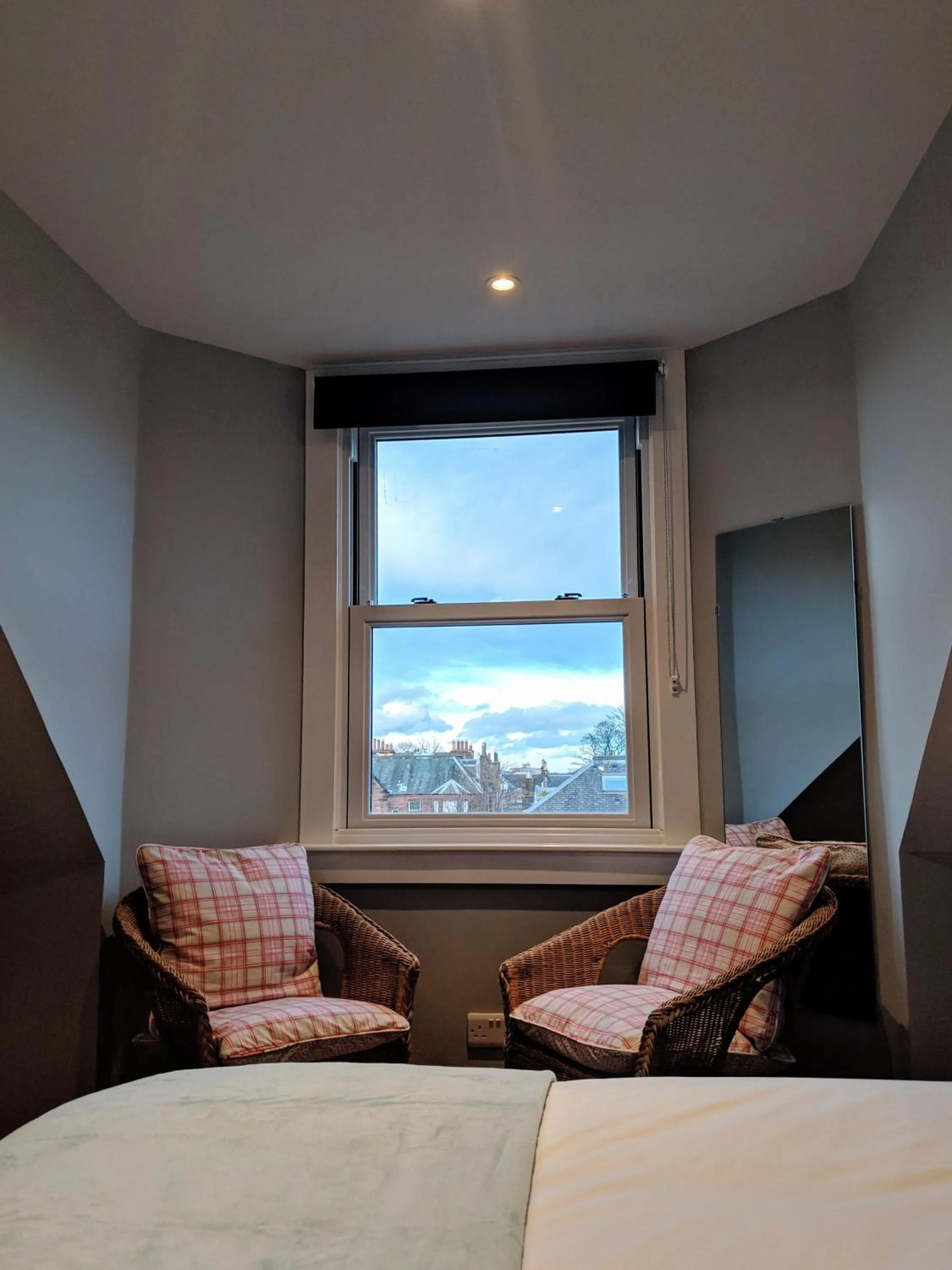 Seating area, Bed in Falcon Crest Guest House