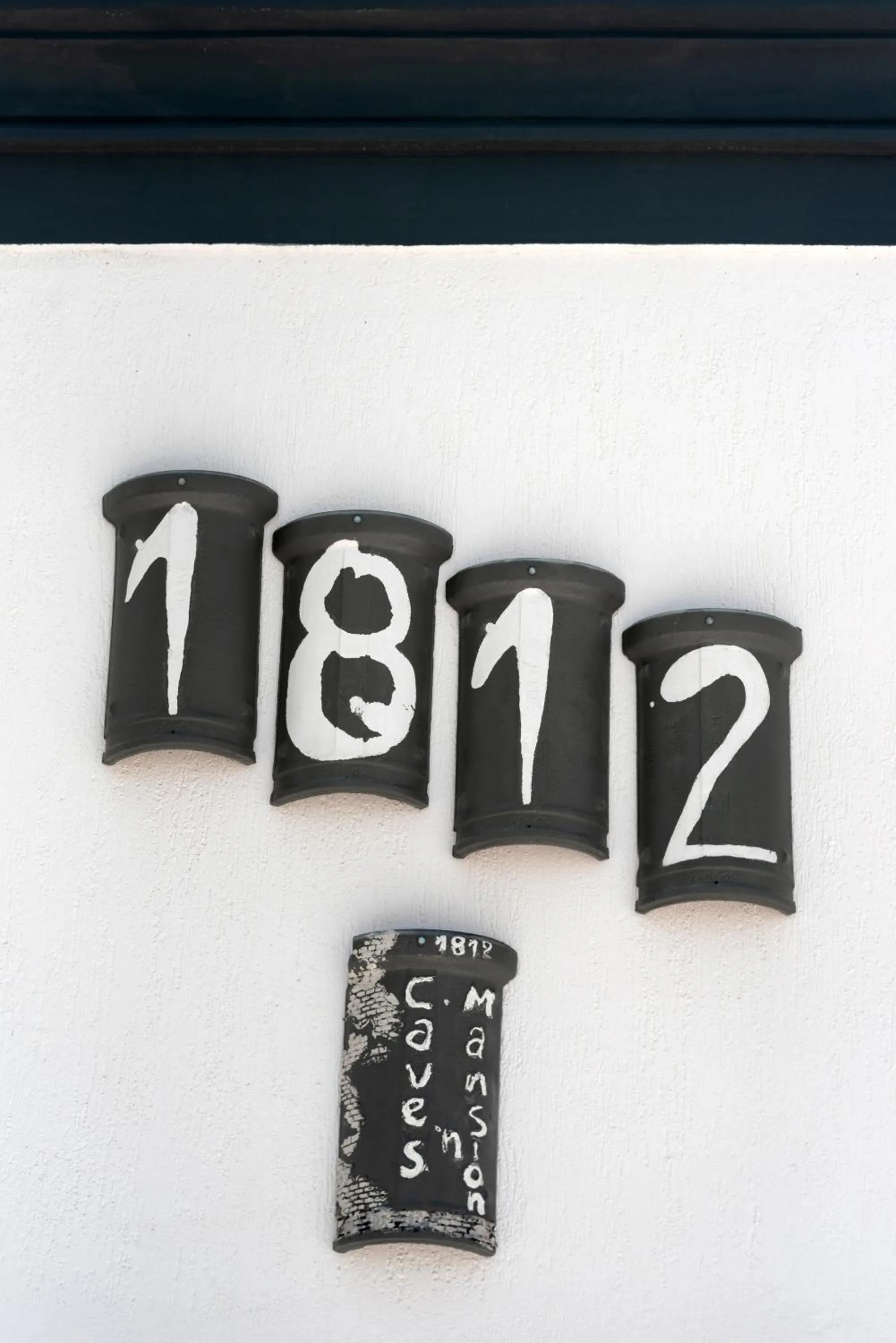 Property logo or sign in 1812 Caves 'n Mansion