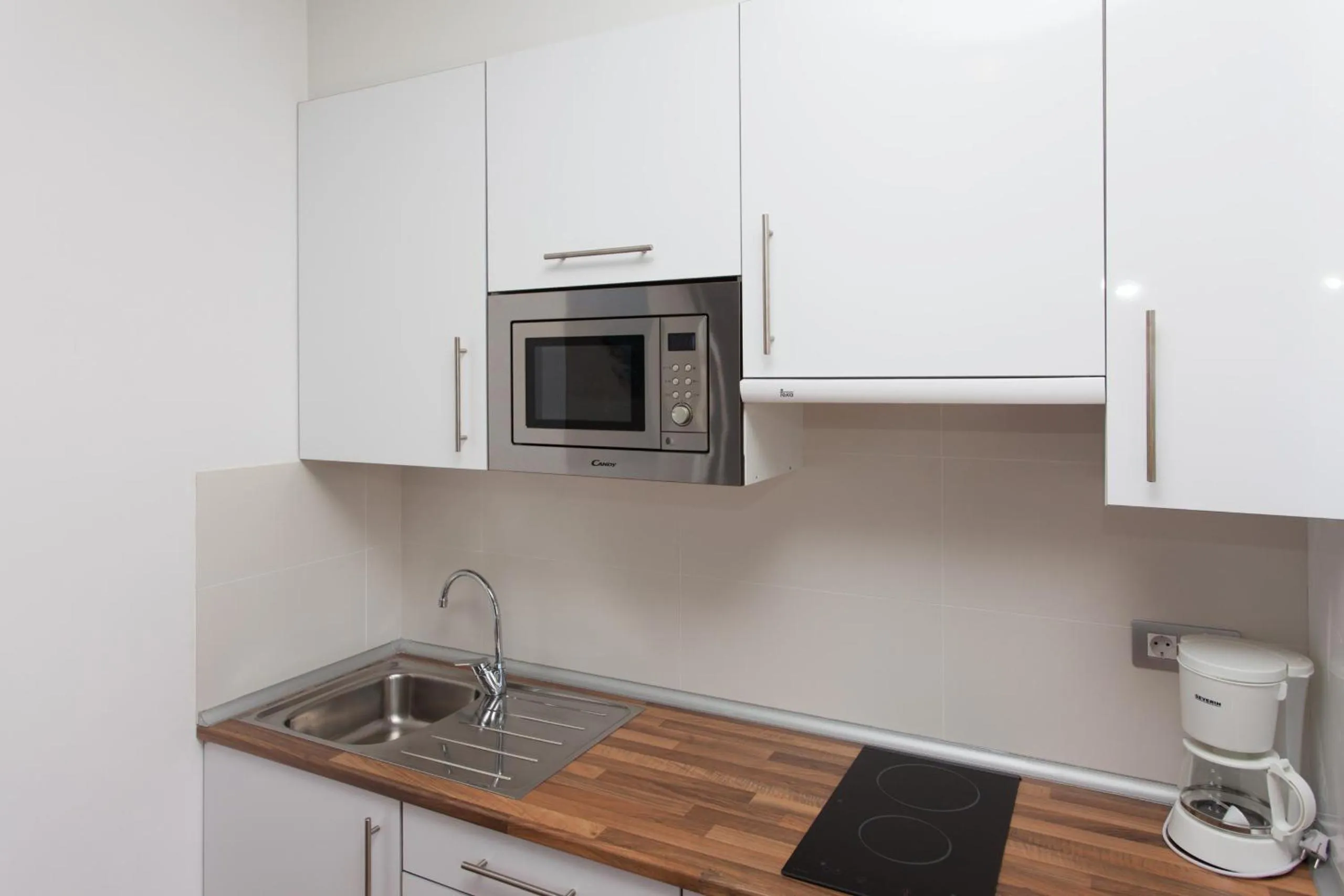 Kitchen or kitchenette in Villas & Apartamentos Tao Mazo