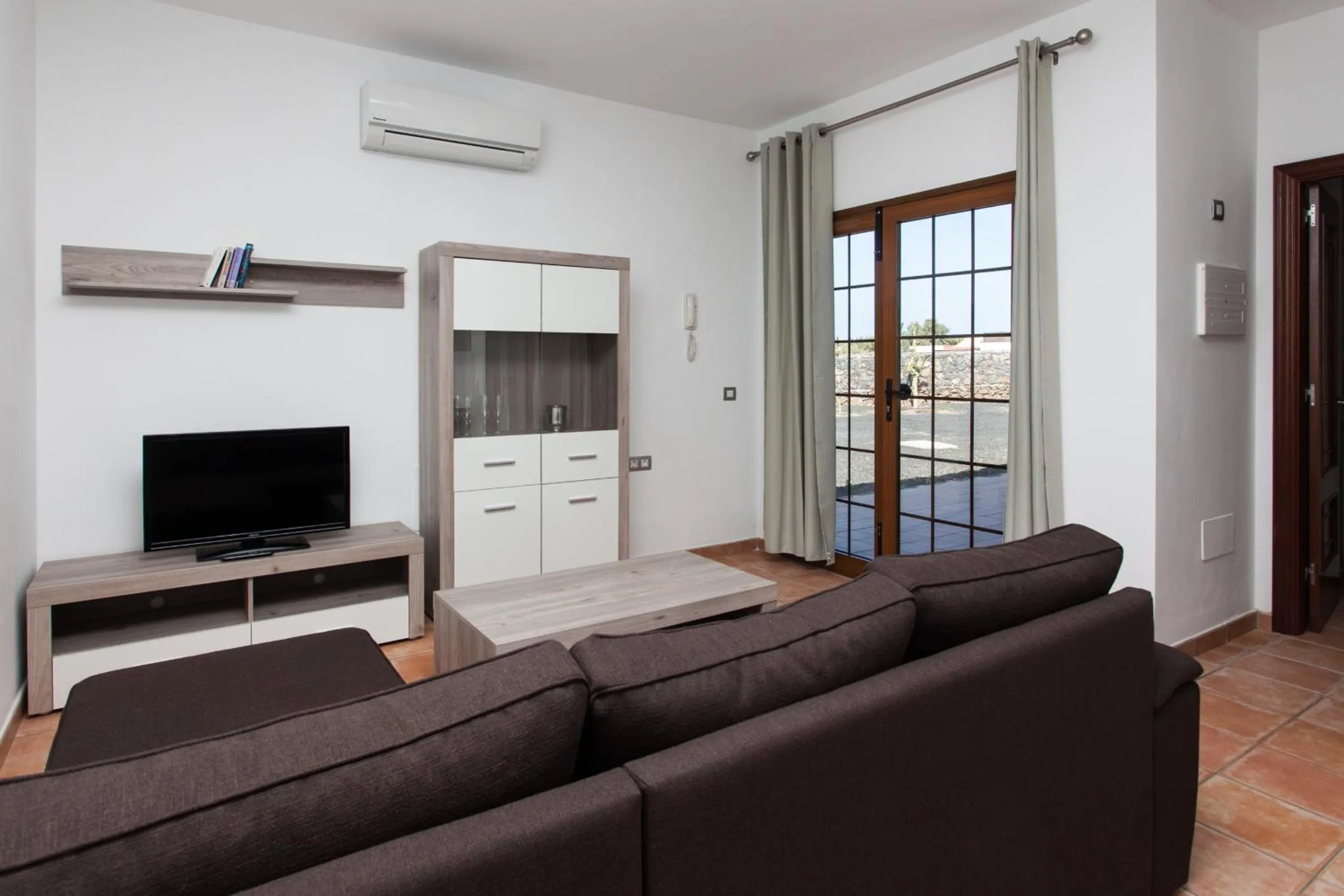 Communal lounge/ TV room in Villas & Apartamentos Tao Mazo