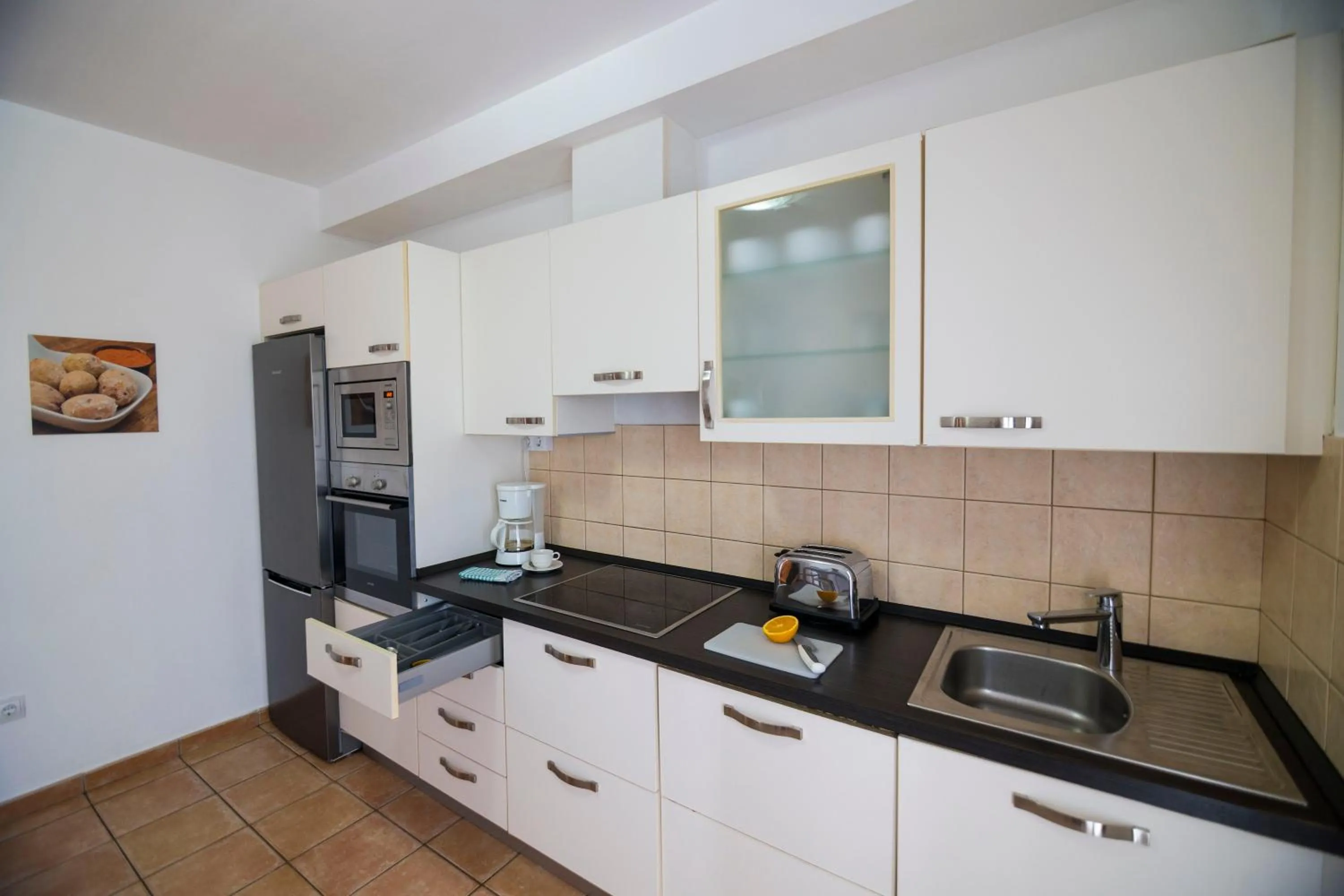 Kitchen or kitchenette in Villas & Apartamentos Tao Mazo