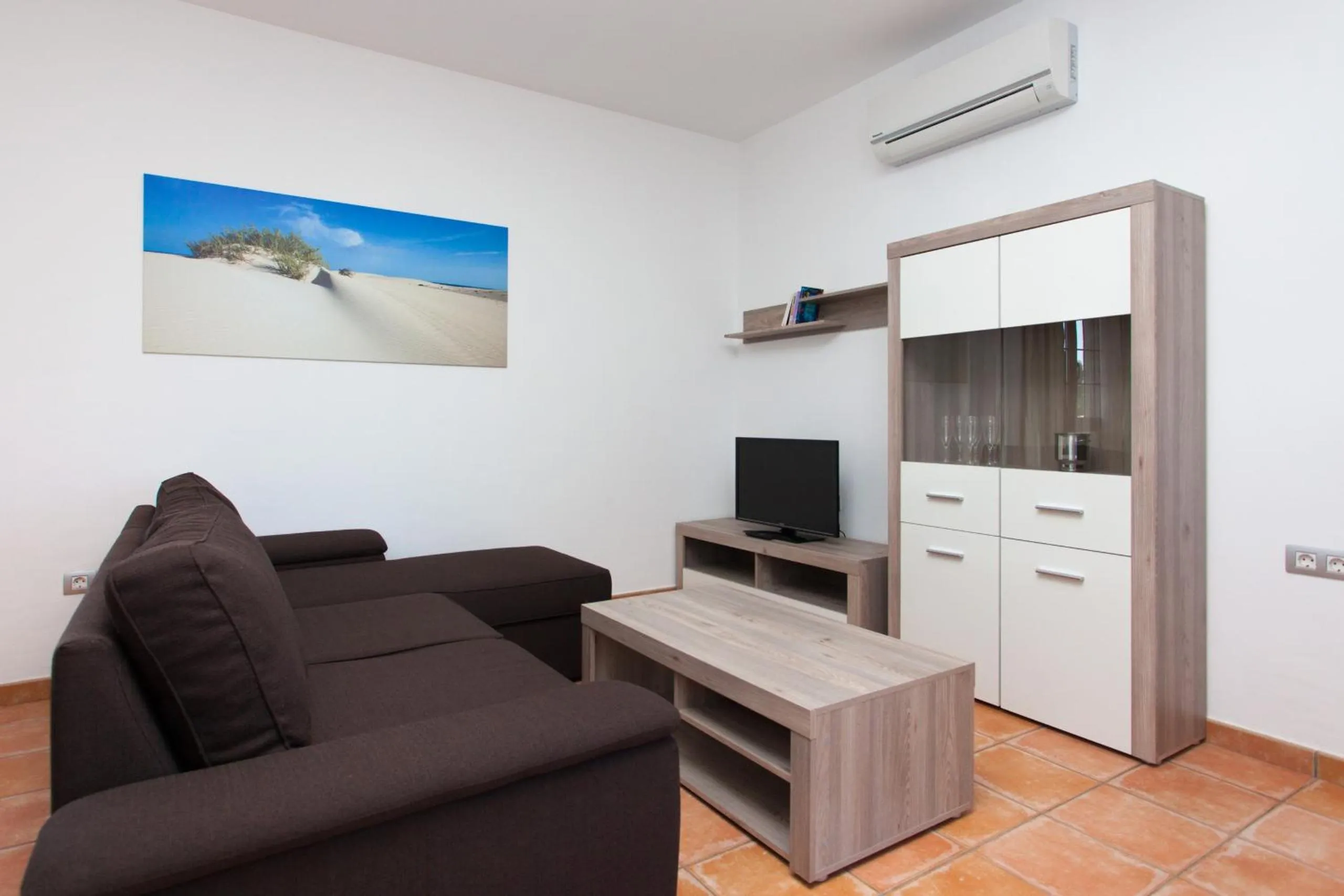 Communal lounge/ TV room in Villas & Apartamentos Tao Mazo