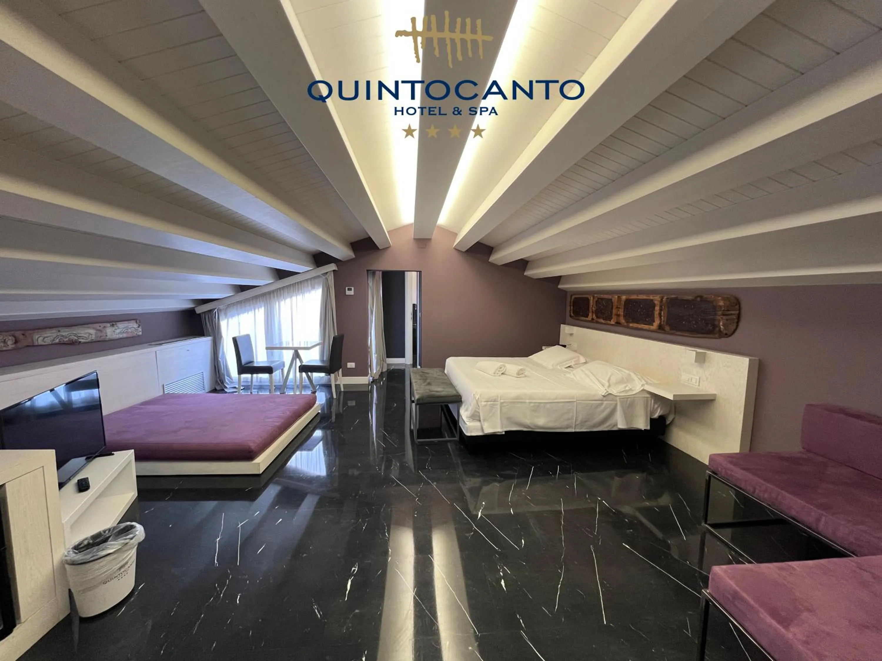Bed in Quintocanto Hotel & Spa