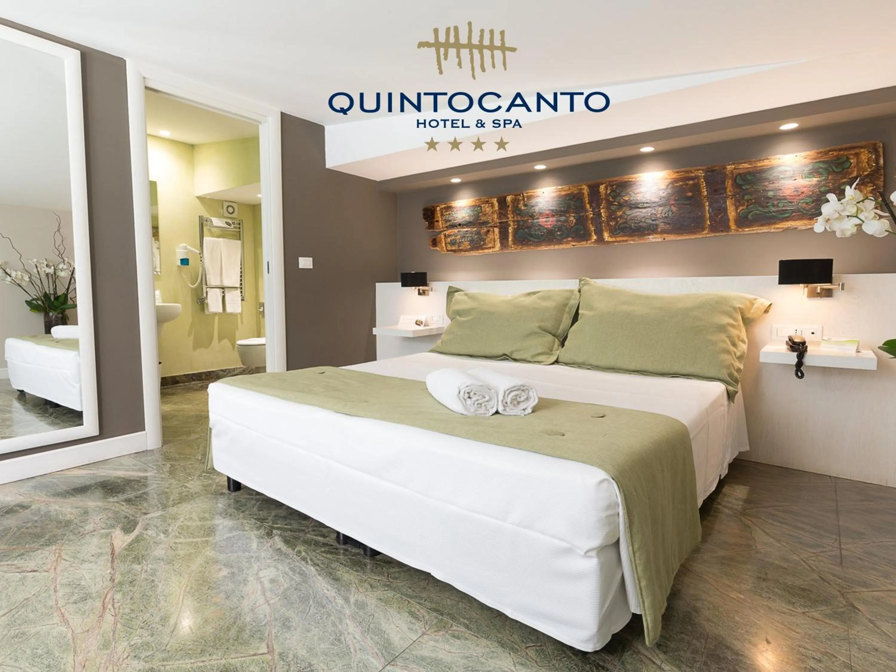 Bed in Quintocanto Hotel & Spa