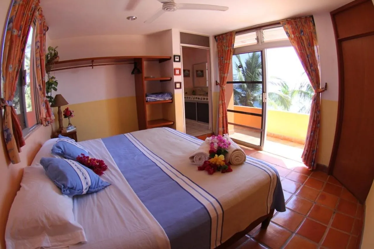 Bed in Hotel Villa Tropical