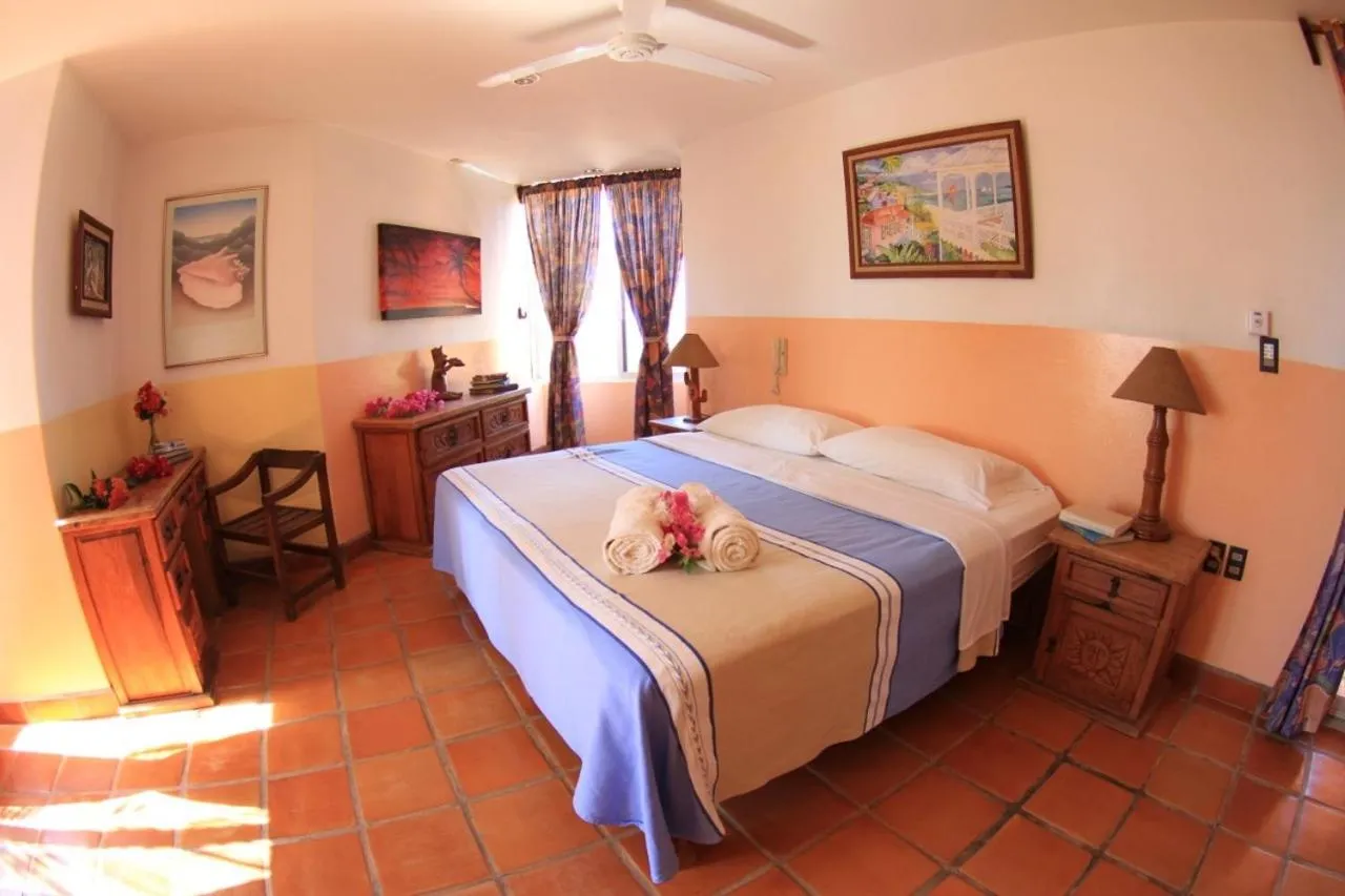 Bed in Hotel Villa Tropical