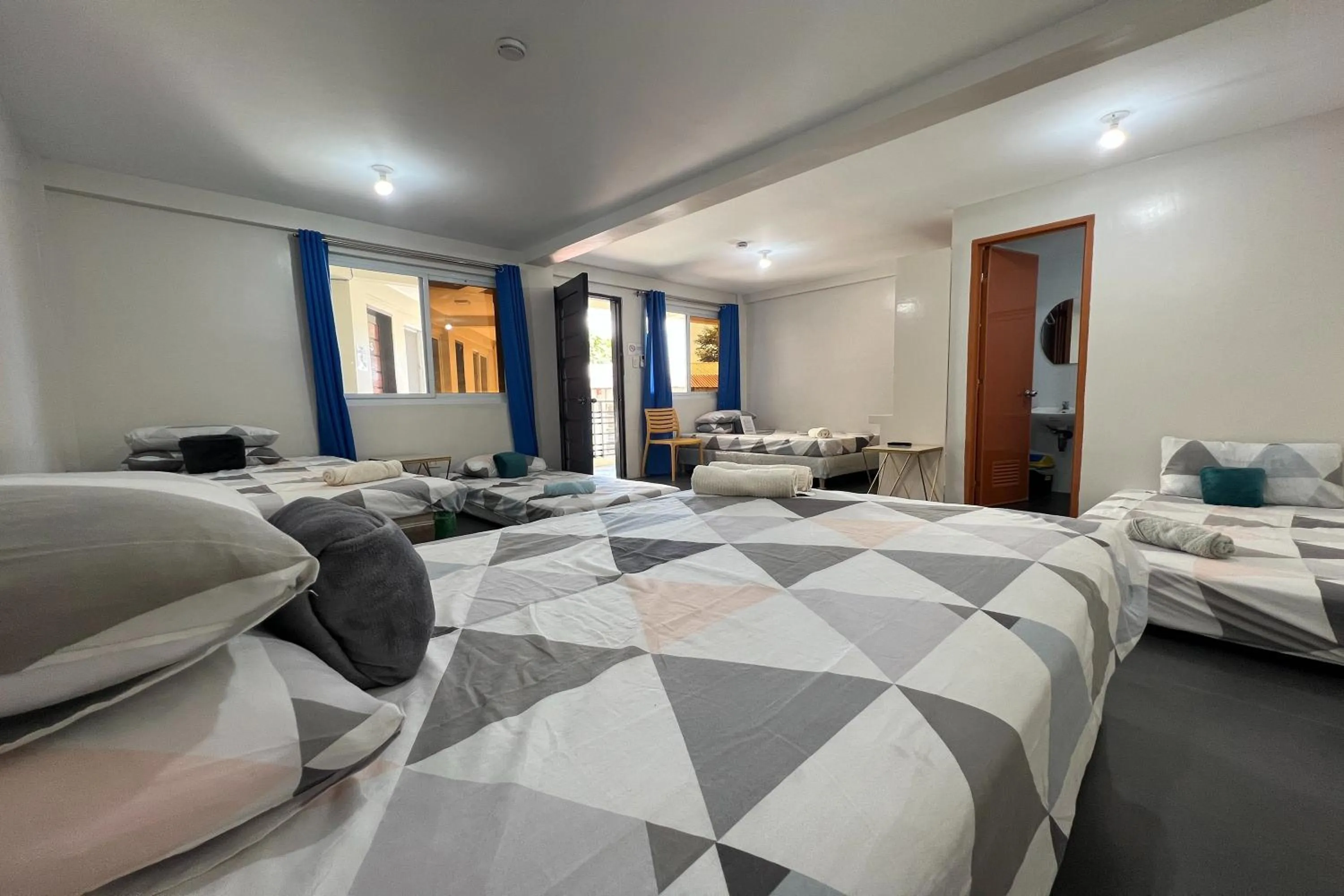 Bed in Happy Grey Hotel Vigan