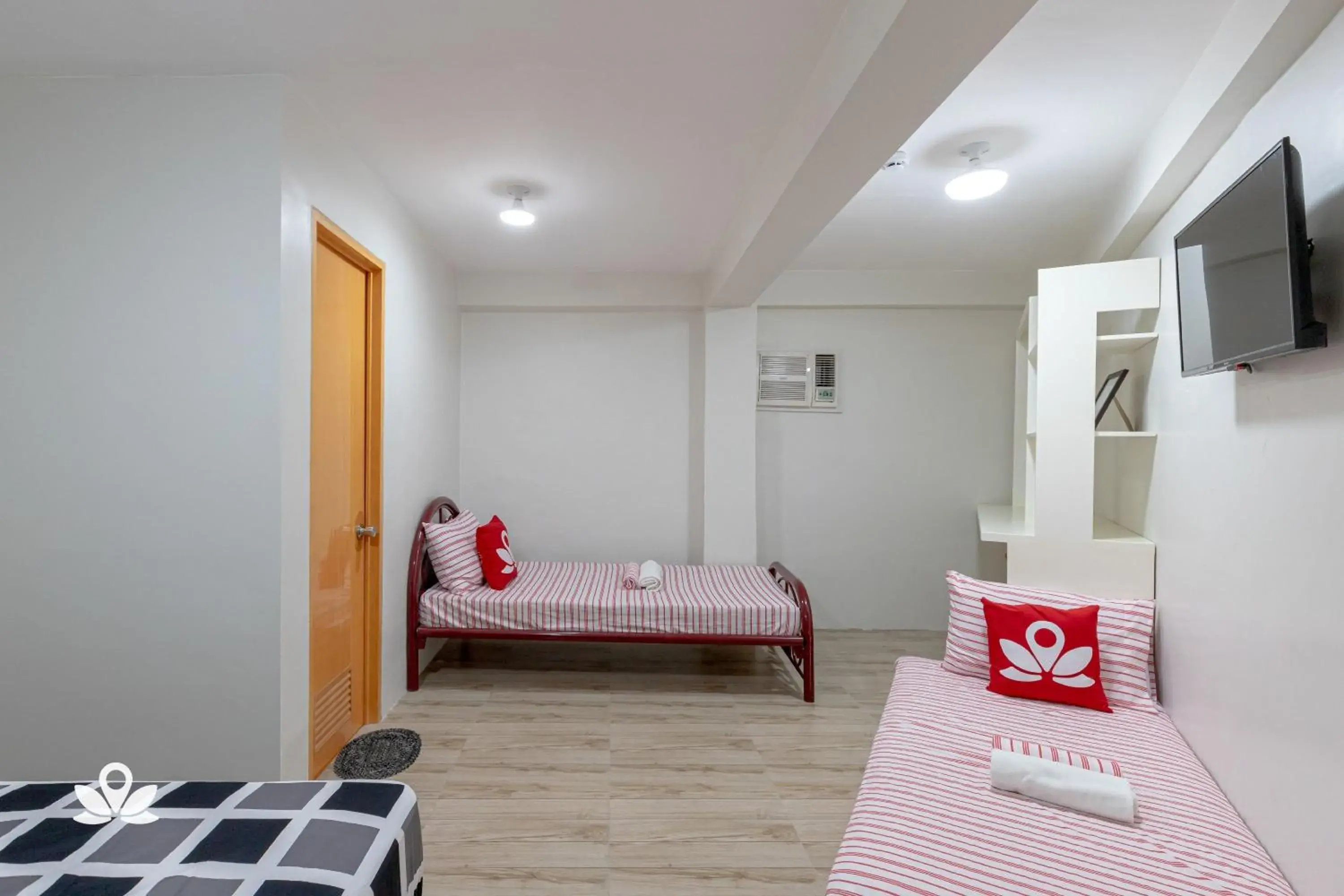 Bed in Happy Grey Hotel Vigan Bed in Happy Grey Hotel Vigan