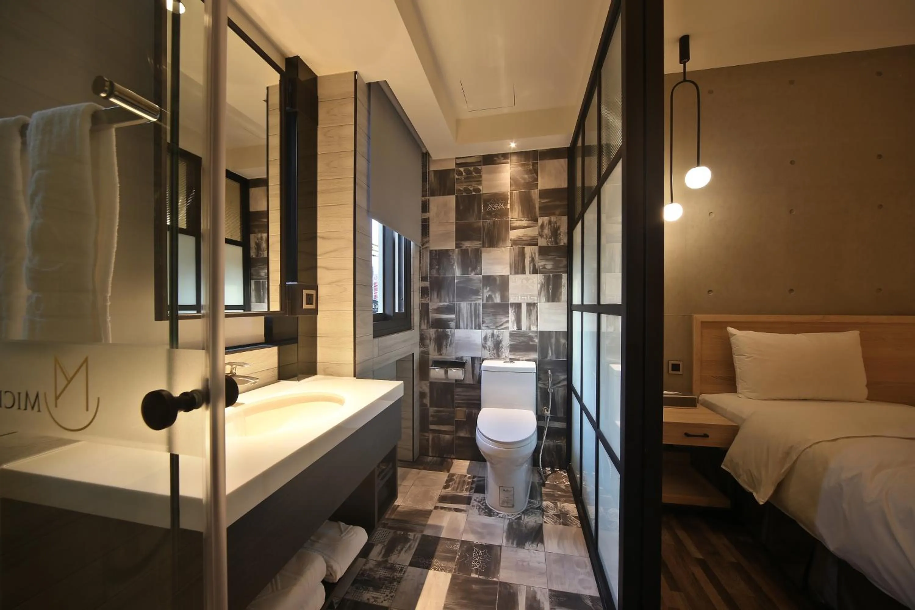 Bathroom, Bed in Fengjia Micro Hotel