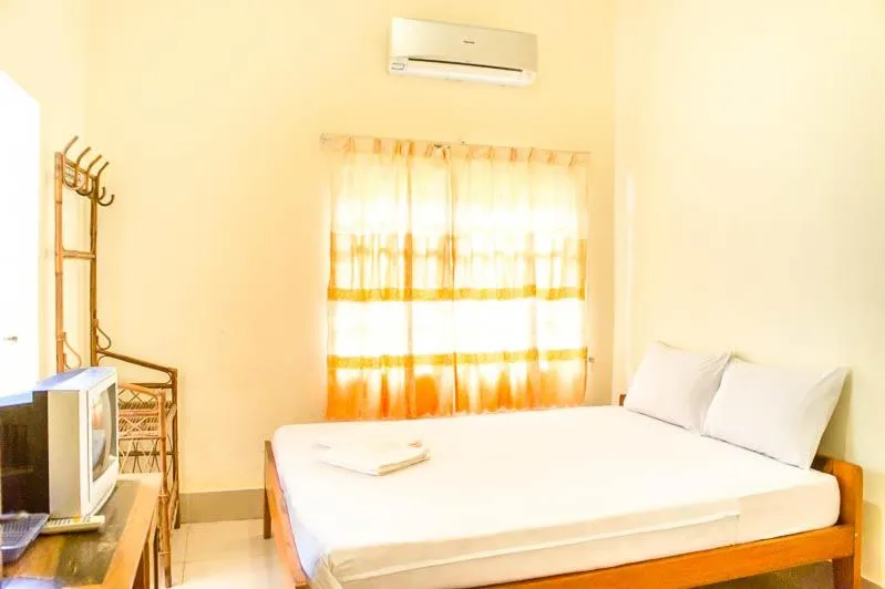 Bed in Visal Sak Guesthouse