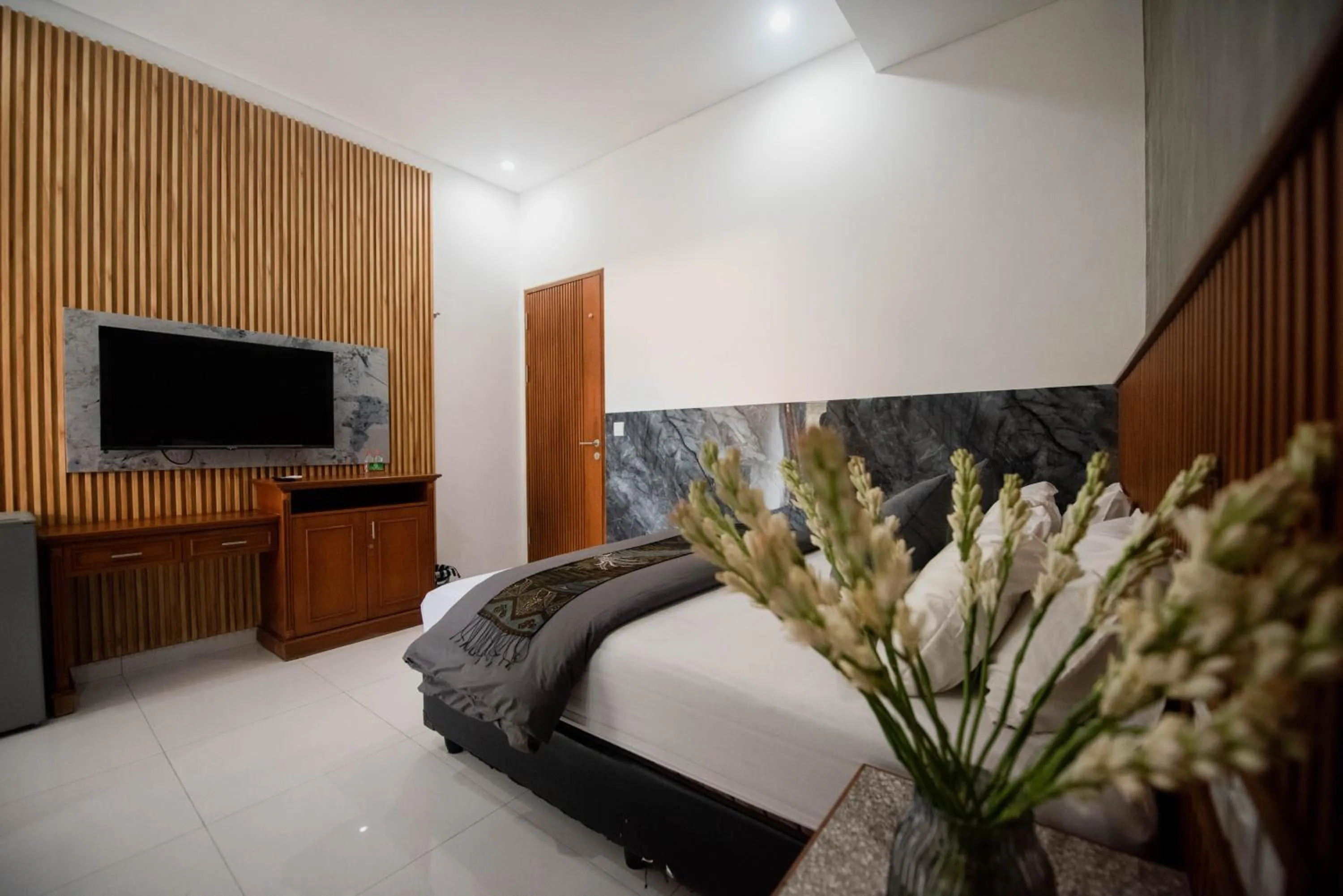 Bed in Sandat Hotel Legian