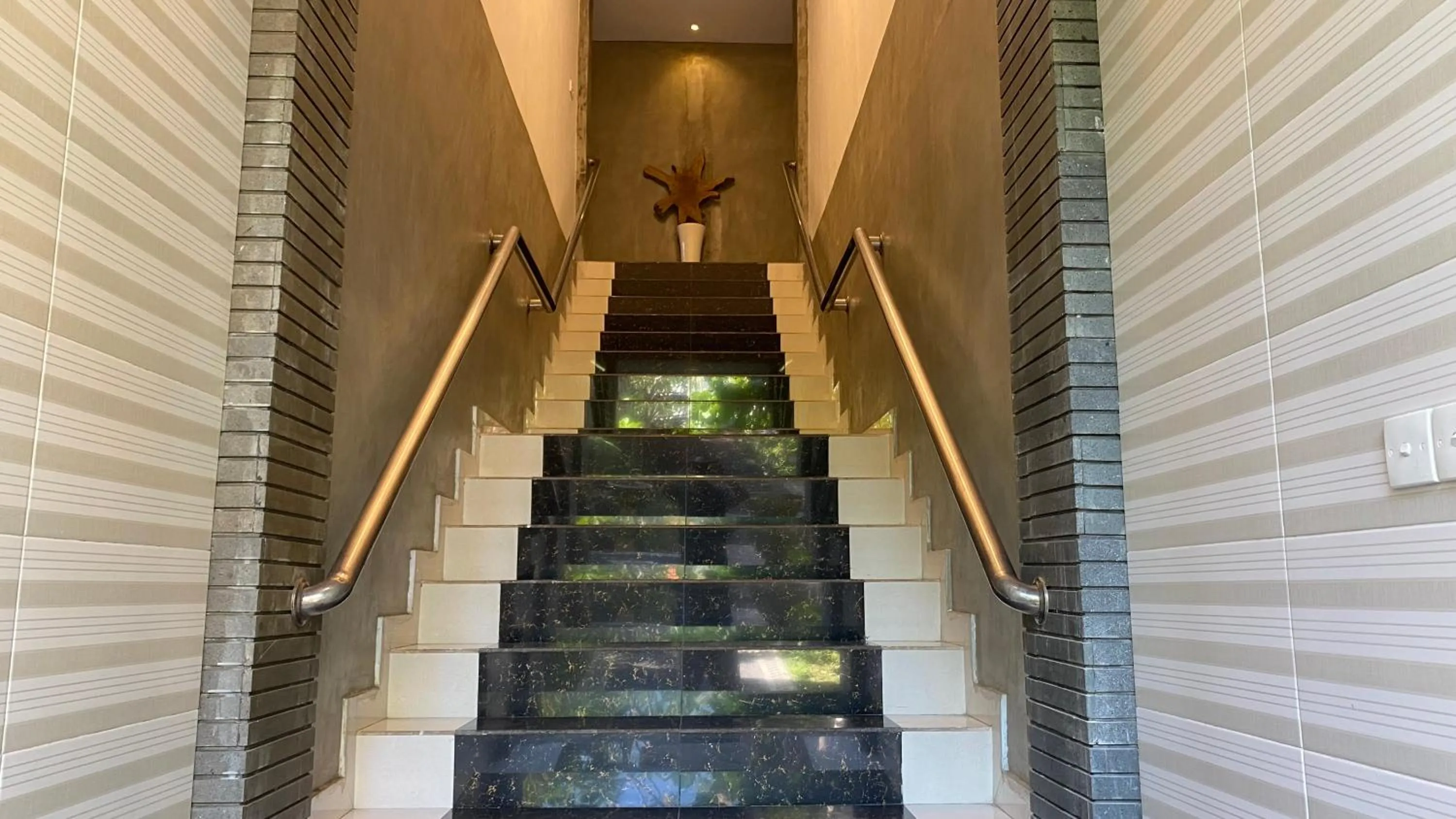 Text overlay in Sandat Hotel Legian