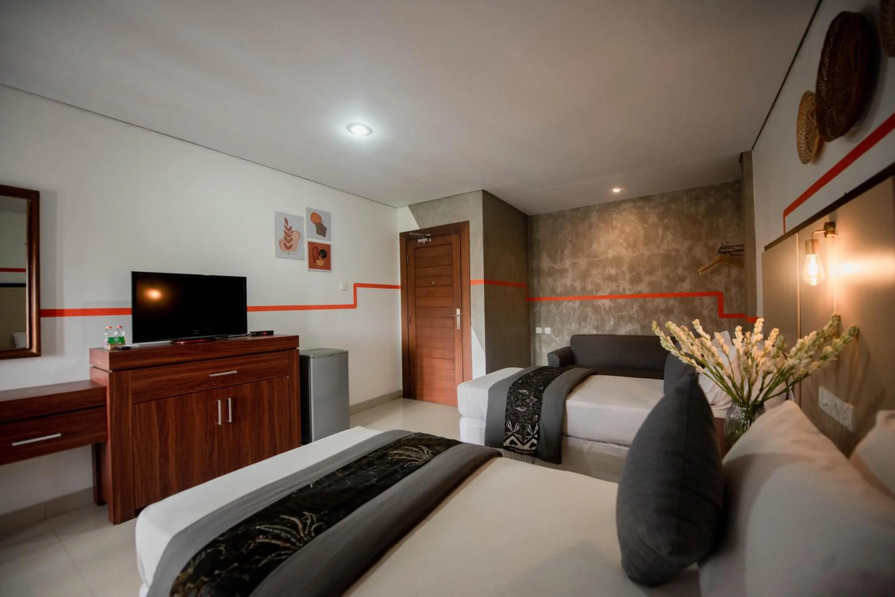 Bed in Sandat Hotel Legian