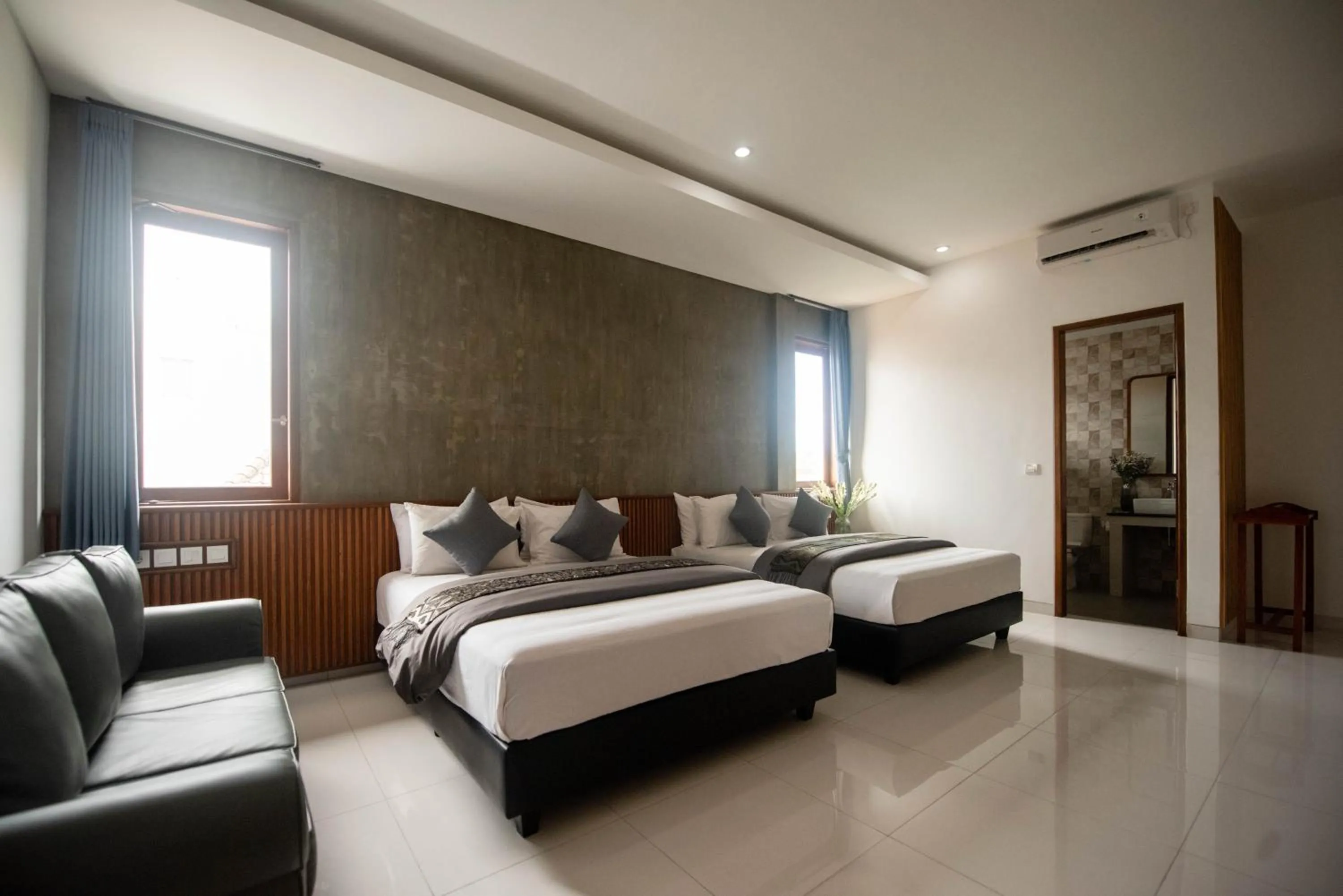 Bed in Sandat Hotel Legian
