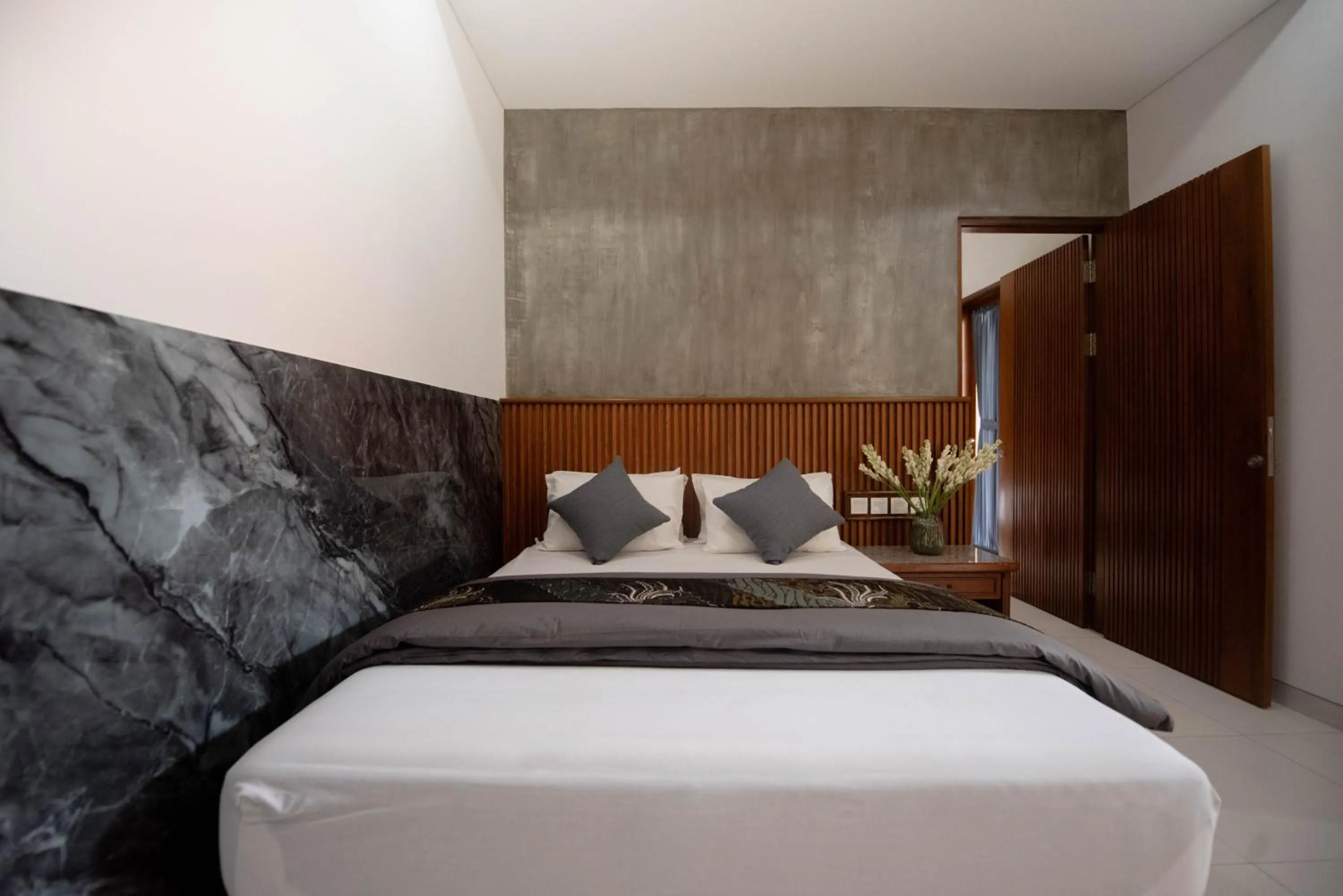 Bed in Sandat Hotel Legian