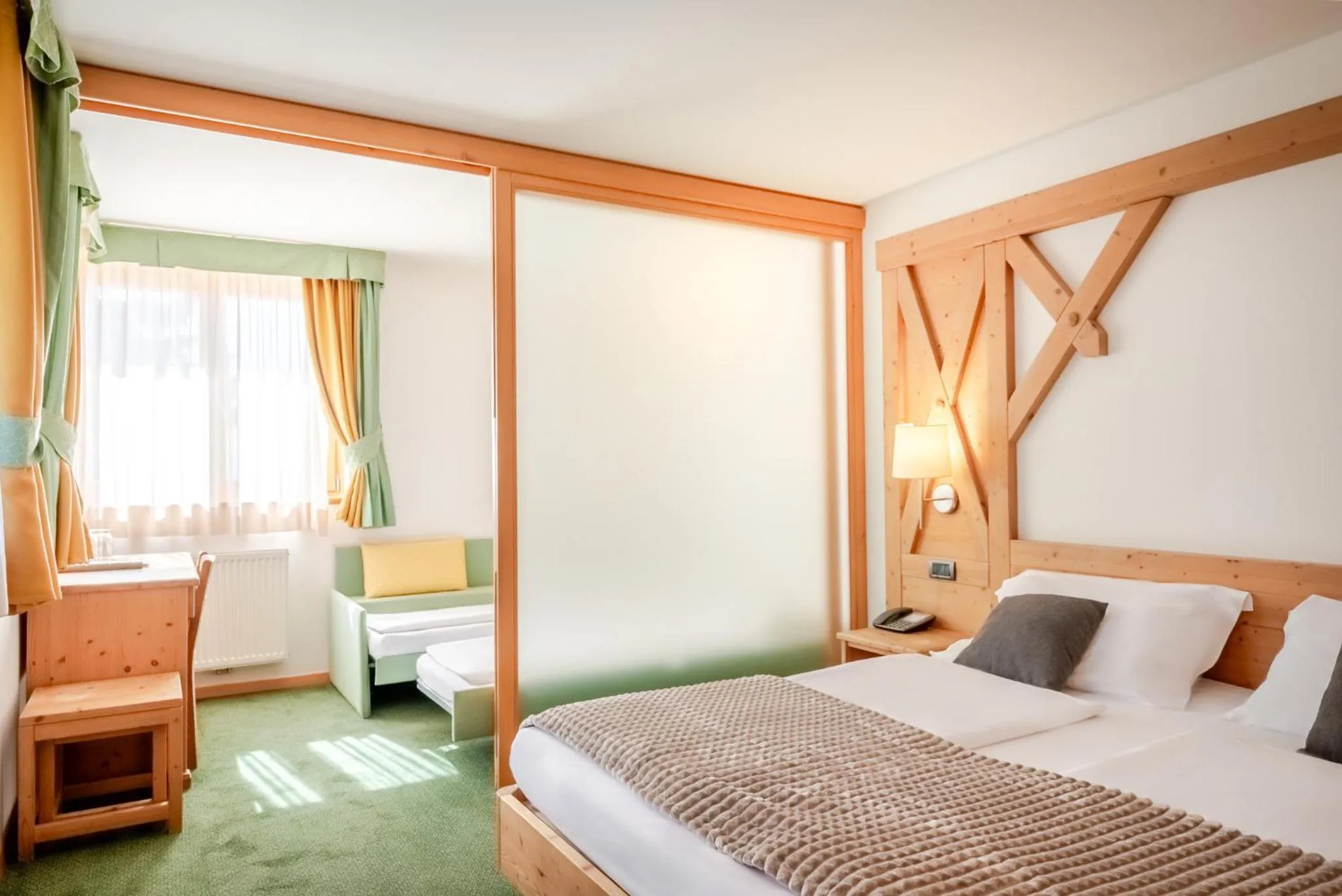 Bed in Hotel Alpine Mugon