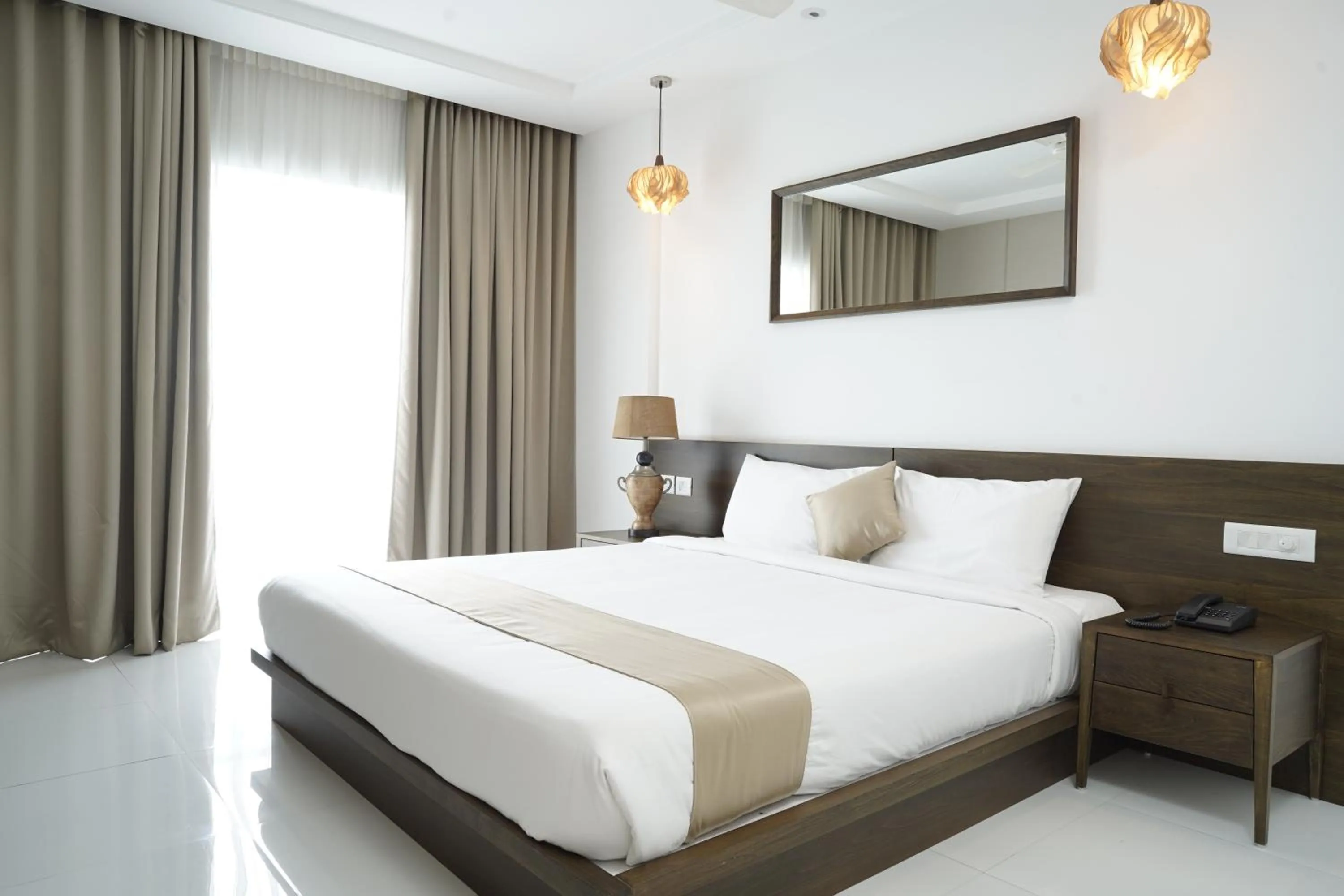 Bed in Kent Baywatch Suites