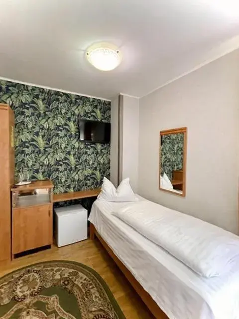 Triple Room in Hotel Sonne Triple Room in Hotel Sonne