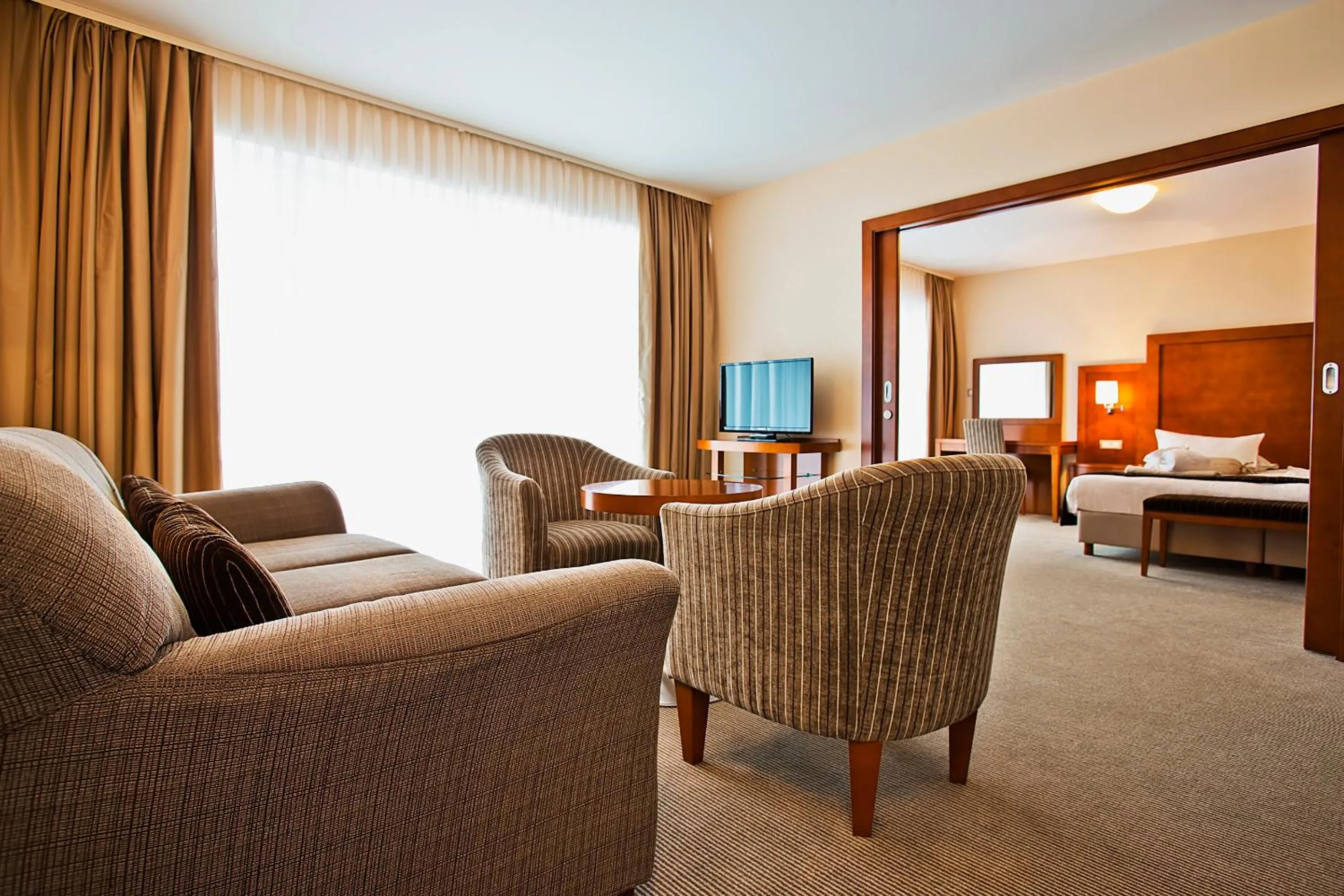 TV and multimedia, Bed in Spa & Wellness Hotel Pinia