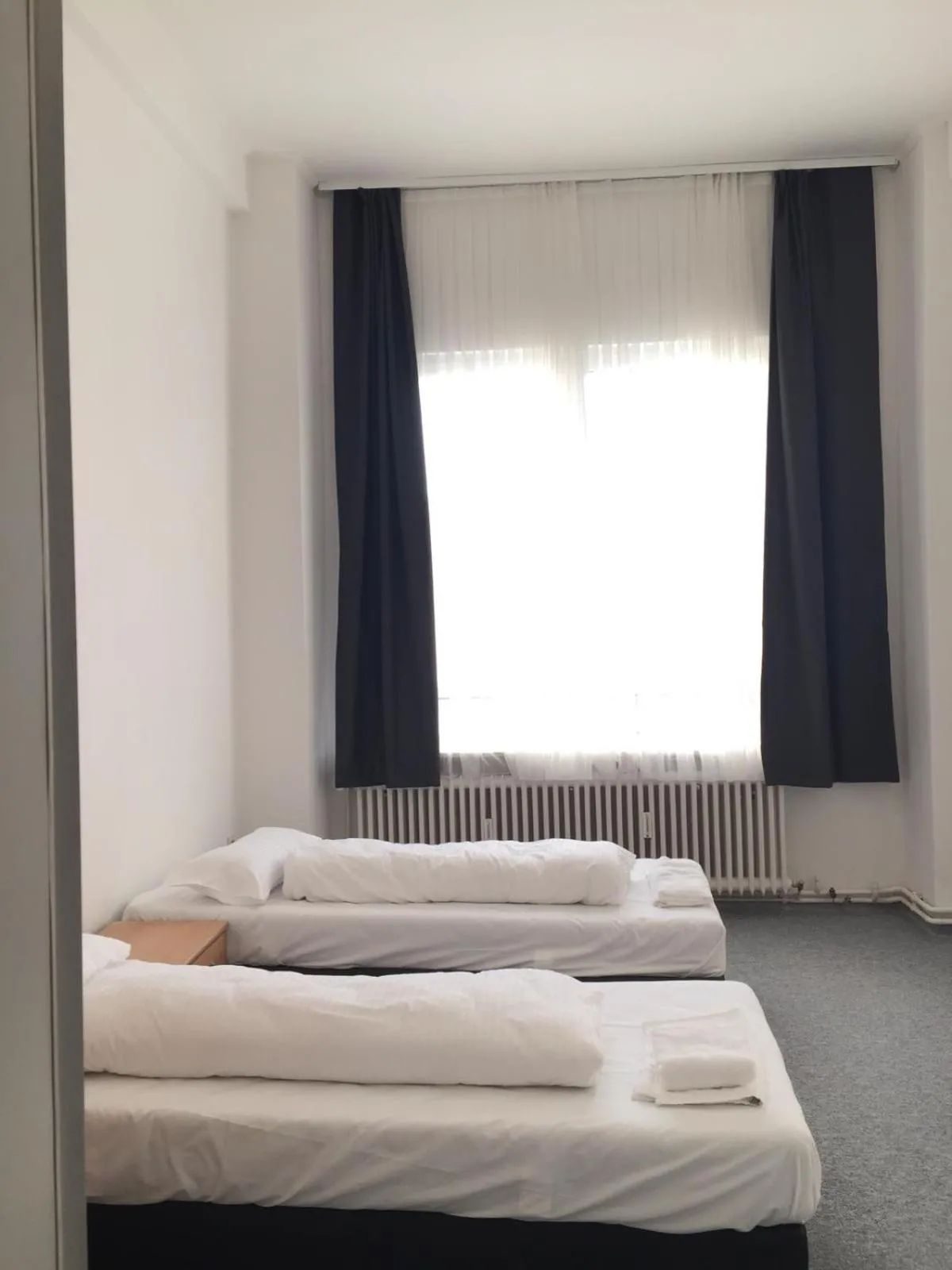 Photo of the whole room, Bed in Pension Dreilinden Hannover GmbH