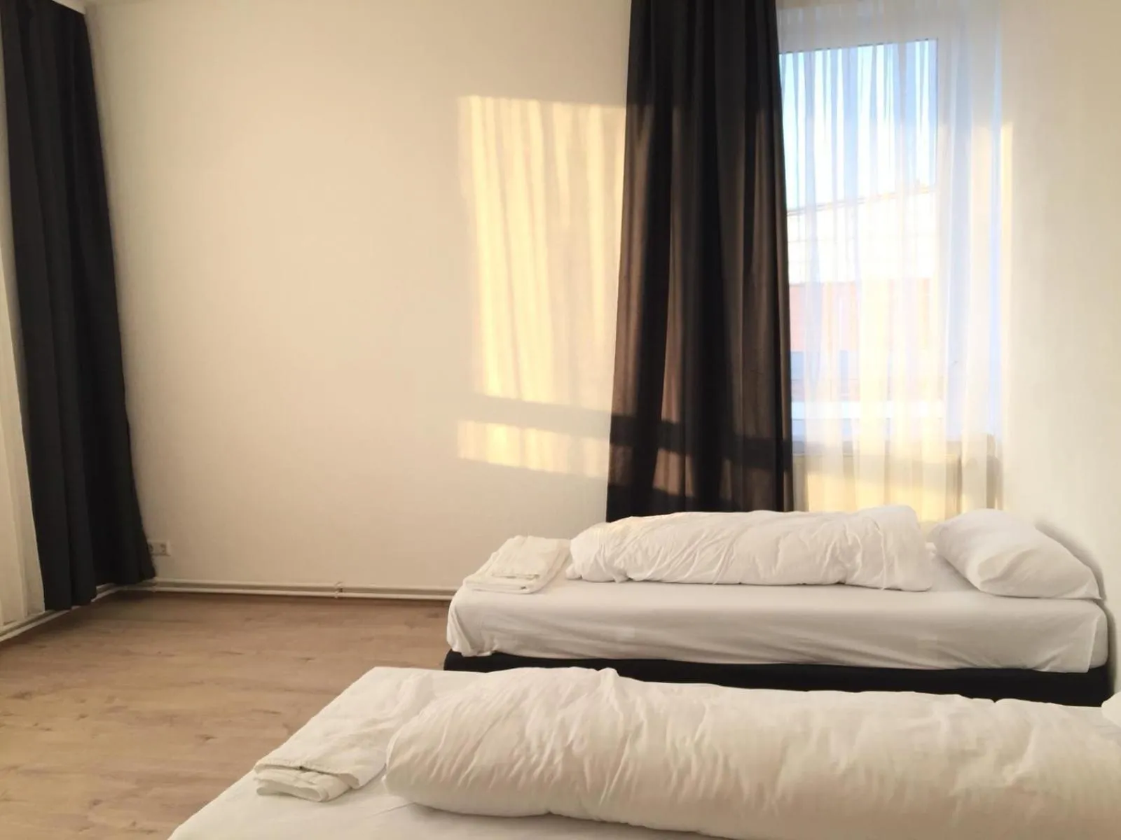 Photo of the whole room, Bed in Pension Dreilinden Hannover GmbH