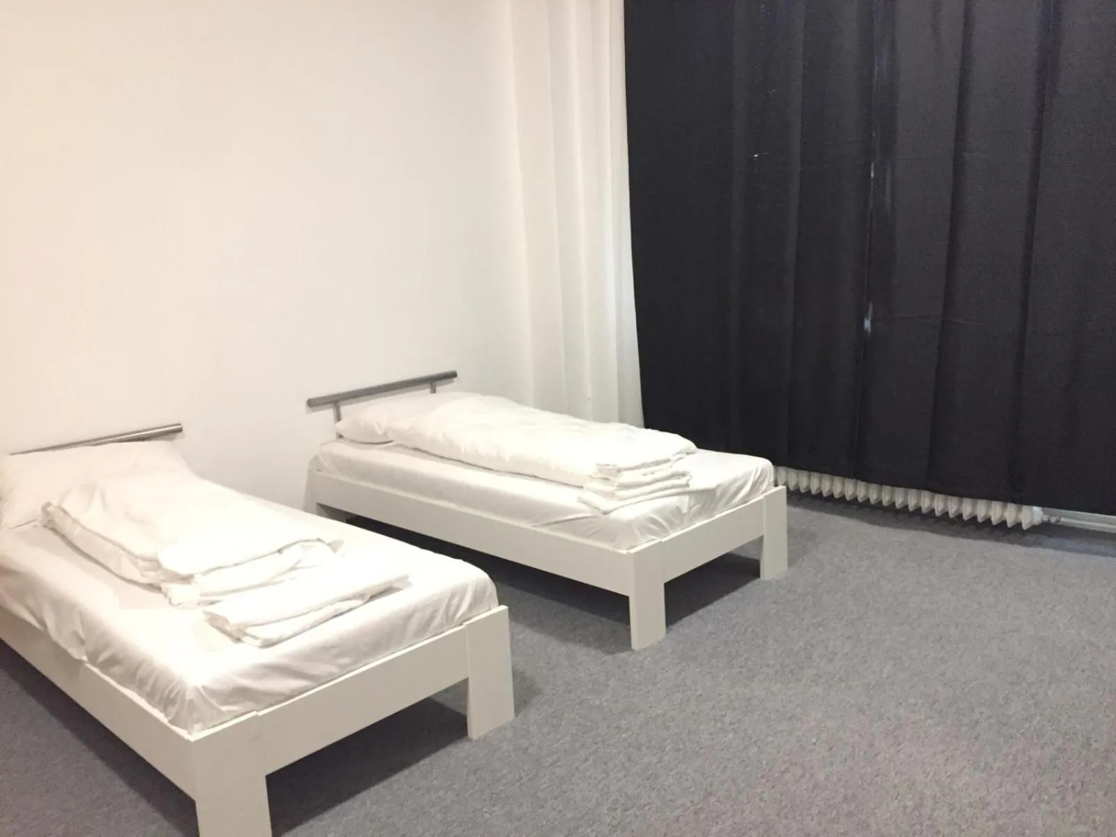 Photo of the whole room, Bed in Pension Dreilinden Hannover GmbH