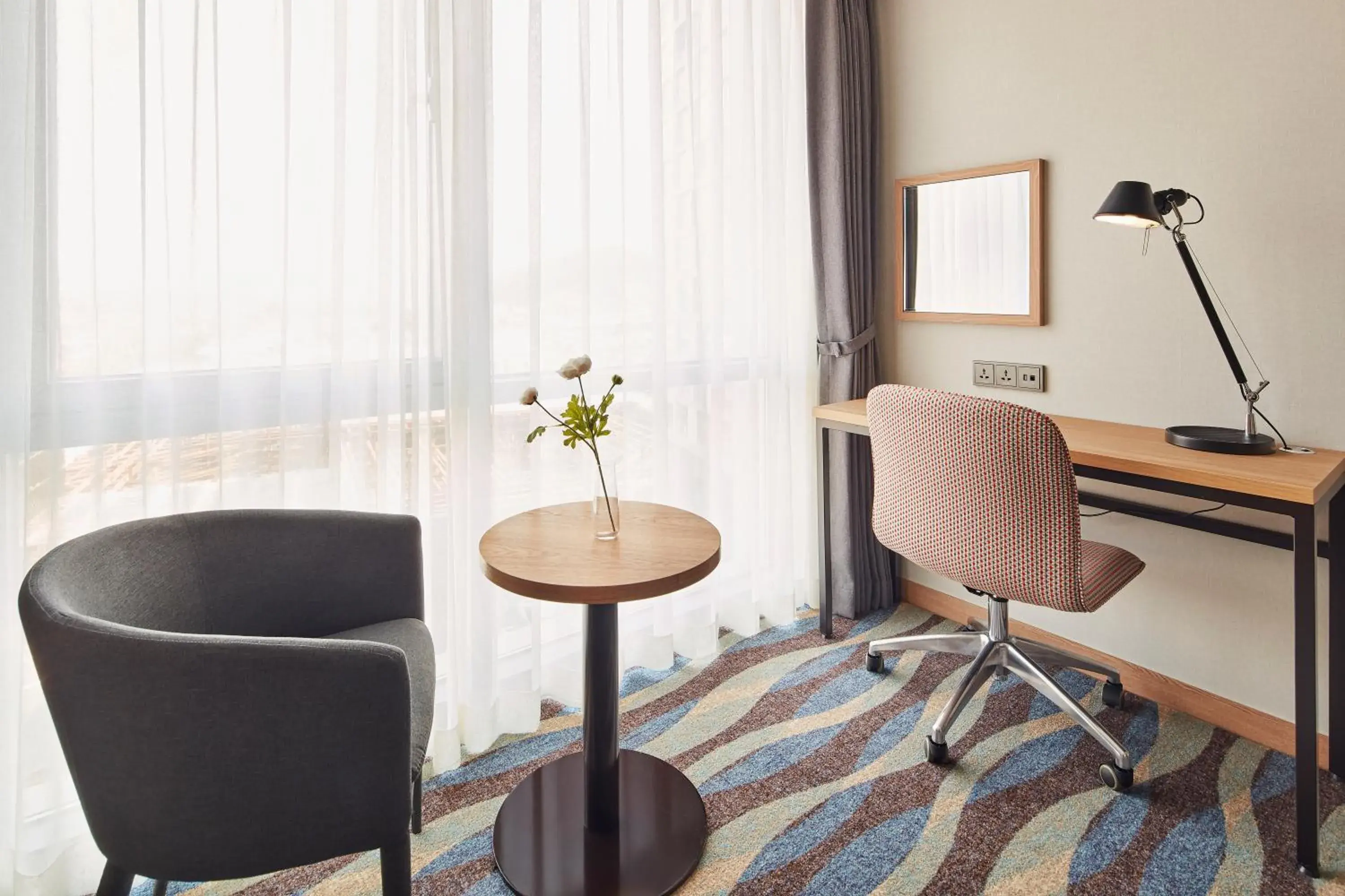 Bedroom in Ramada Encore by Wyndham Gimpo Han River Hotel Bedroom in Ramada Encore by Wyndham Gimpo Han River Hotel