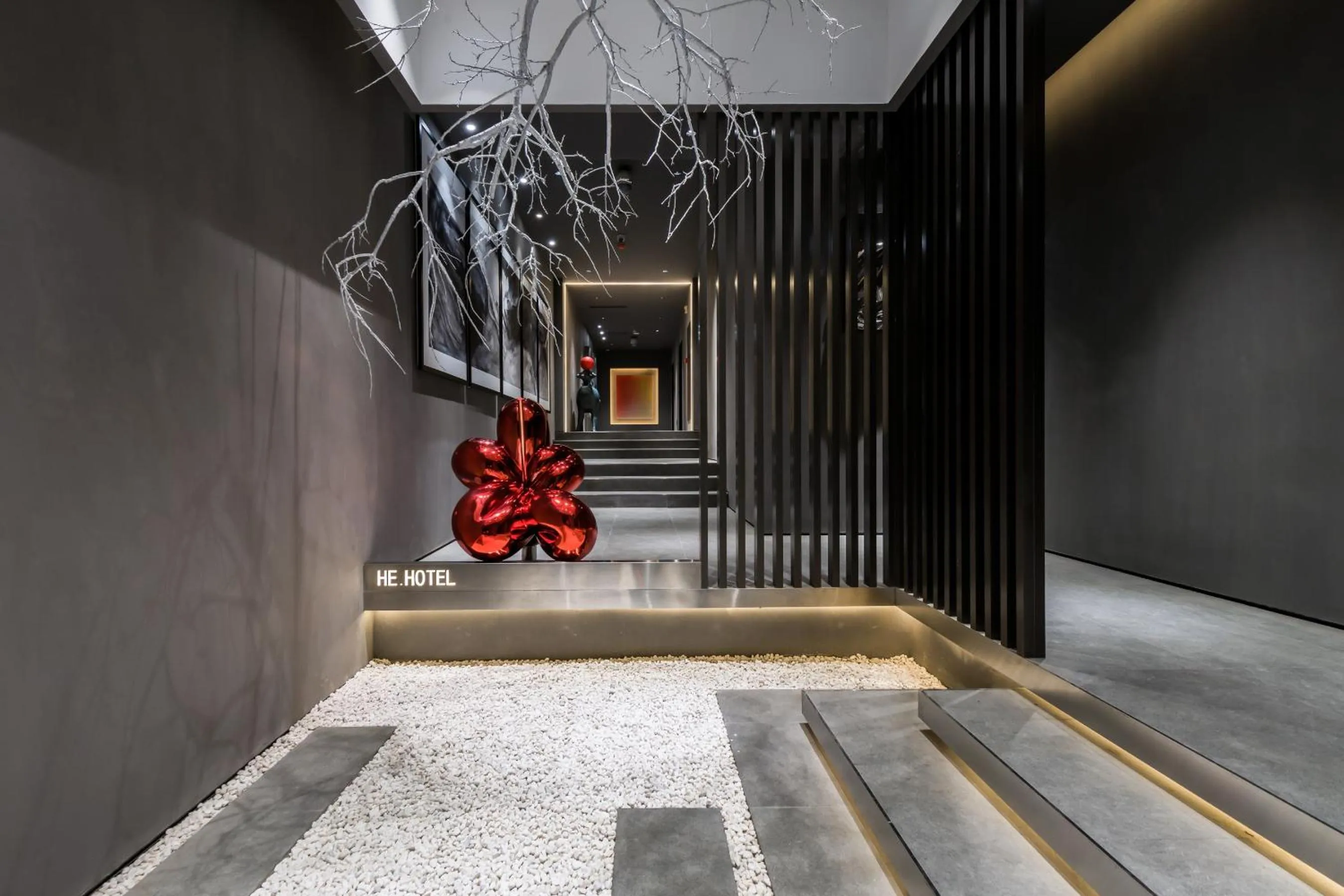 Property building in HeSu Hidden Art Hotel & Suites -Near Xi'an Drum Tower and Yongning Gate -Free Laundry Luggage Storage -Kitty Café with Freshly Ground Coffee -24H Front Desk -English Service -Exclusive Subsidies for Dumpling Banquet & Show