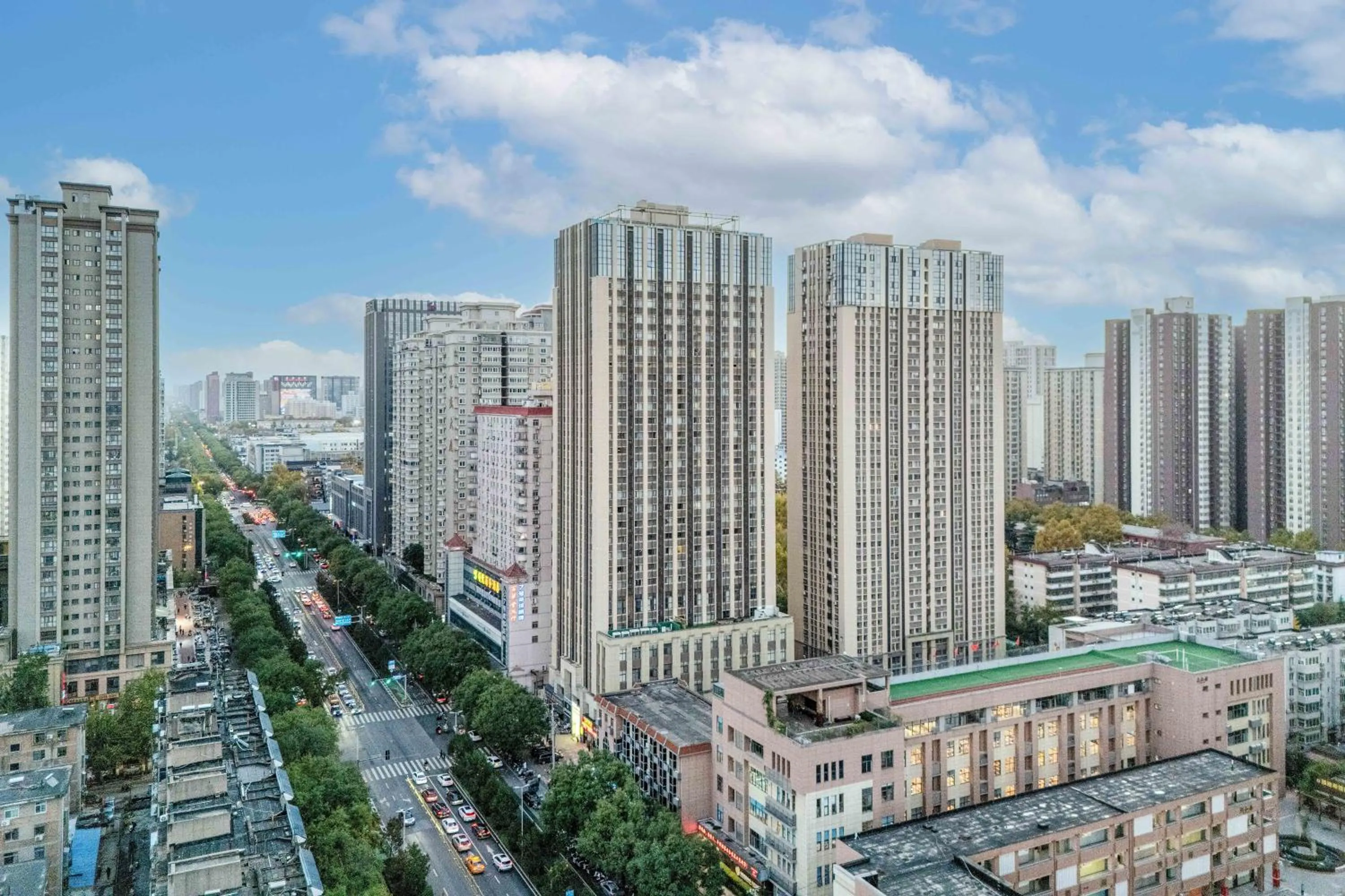 Property building in HeSu Hidden Art Hotel & Suites -Near Xi'an Drum Tower and Yongning Gate -Free Laundry Luggage Storage -Kitty Café with Freshly Ground Coffee -24H Front Desk -English Service -Exclusive Subsidies for Dumpling Banquet & Show