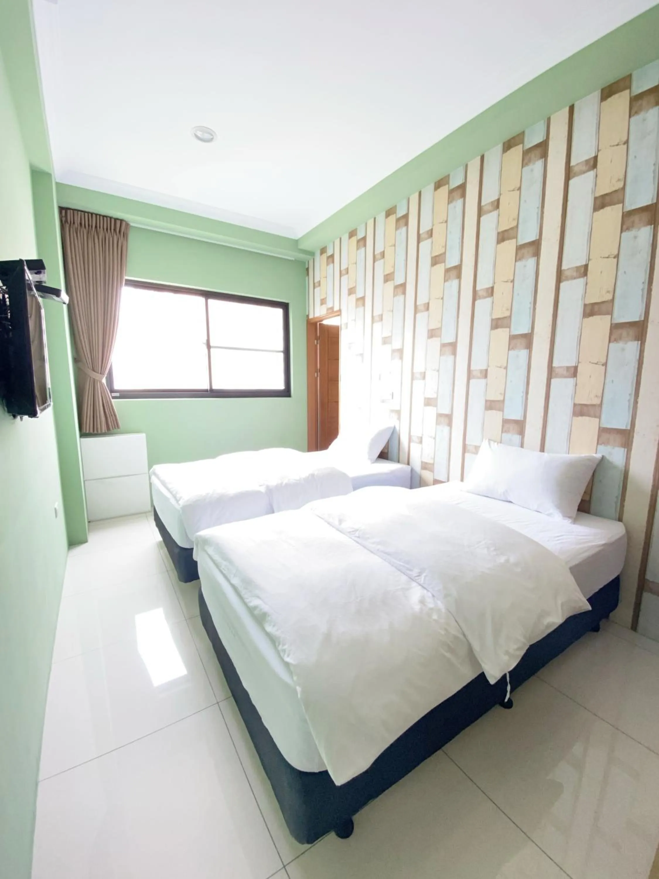 Bed in 108 House Inn