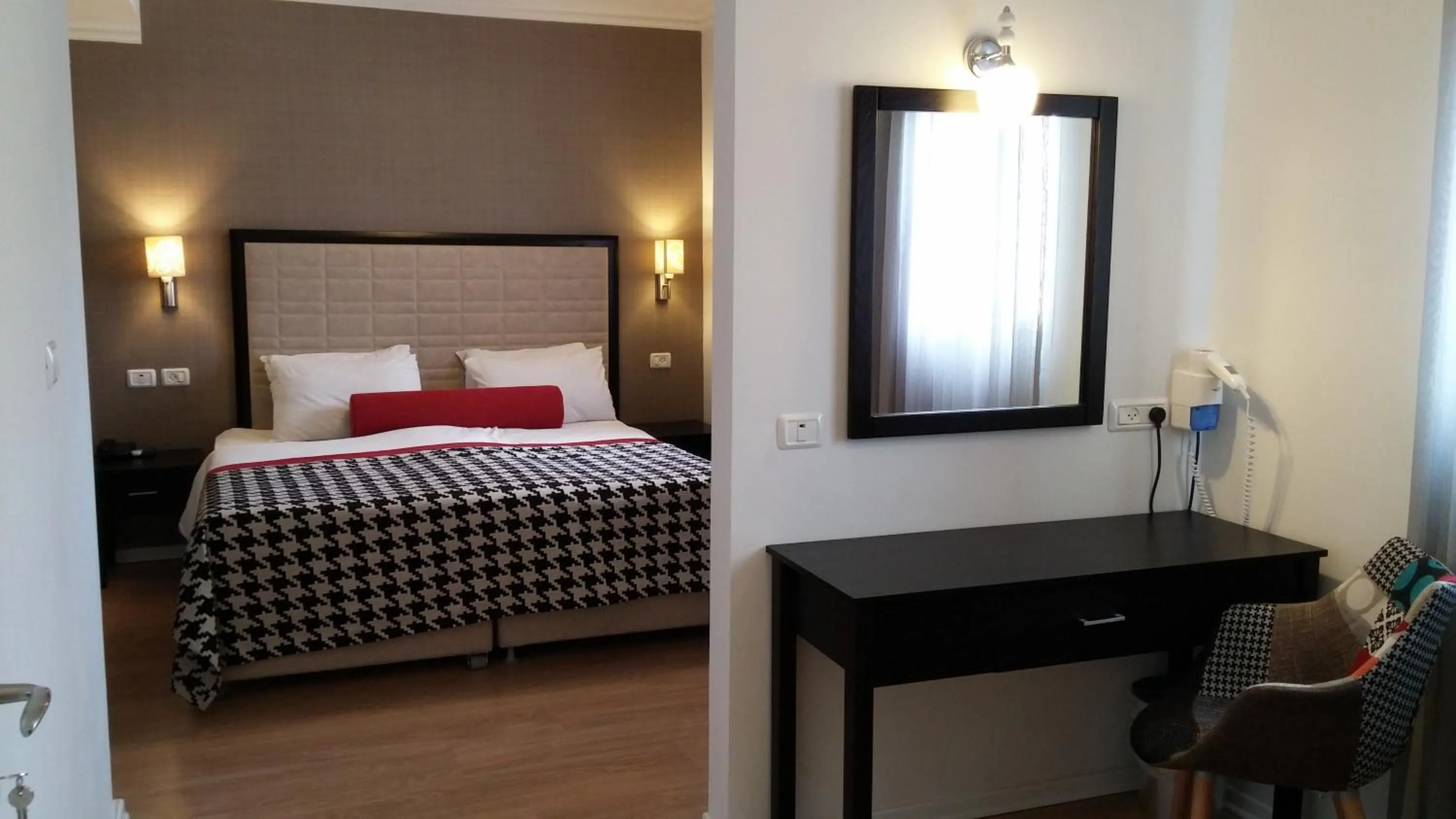 Photo of the whole room, Bed in Astoria Galilee Hotel