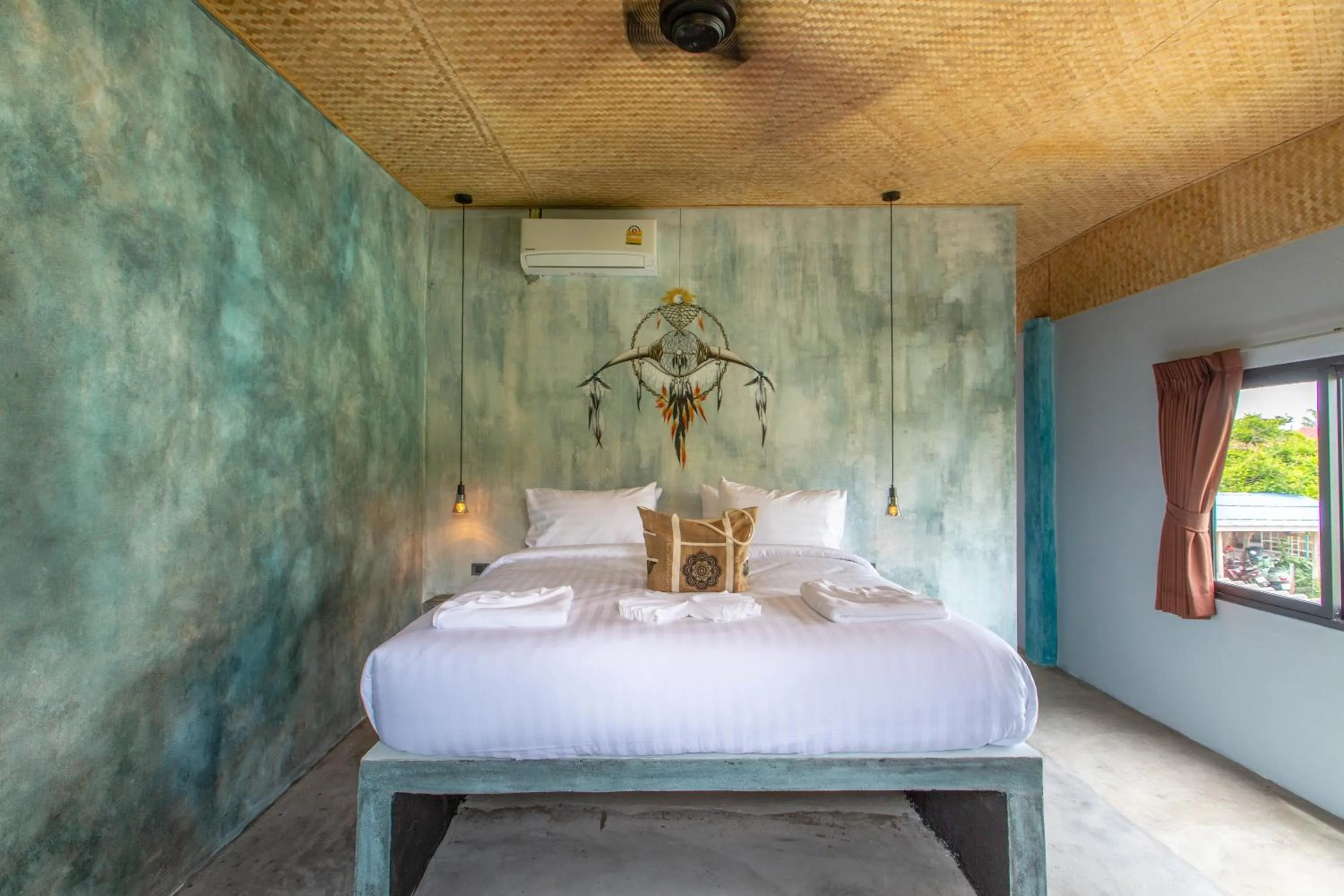 Bed in Dreamcatcher Boutique Hotel