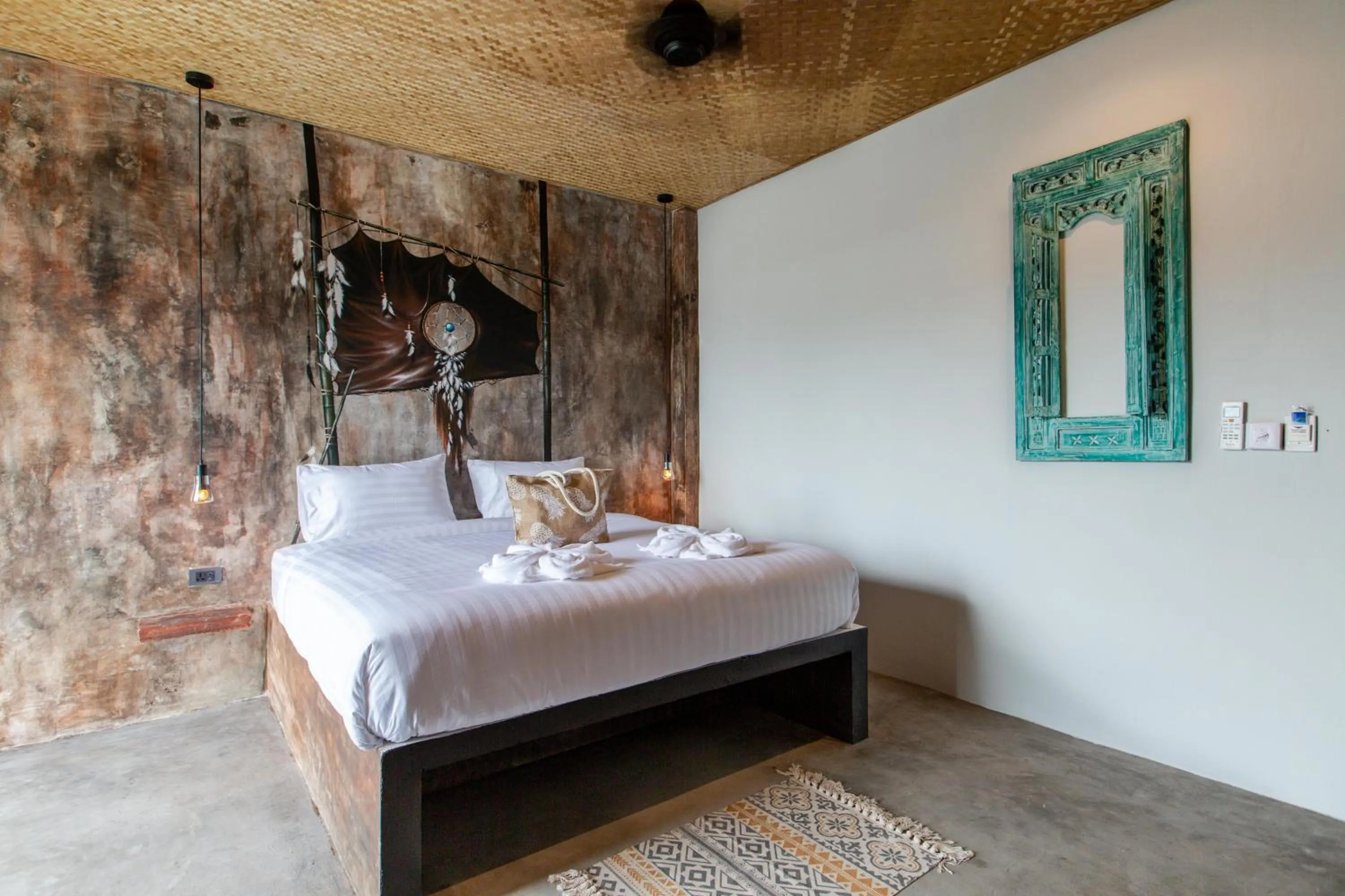 Bed in Dreamcatcher Boutique Hotel