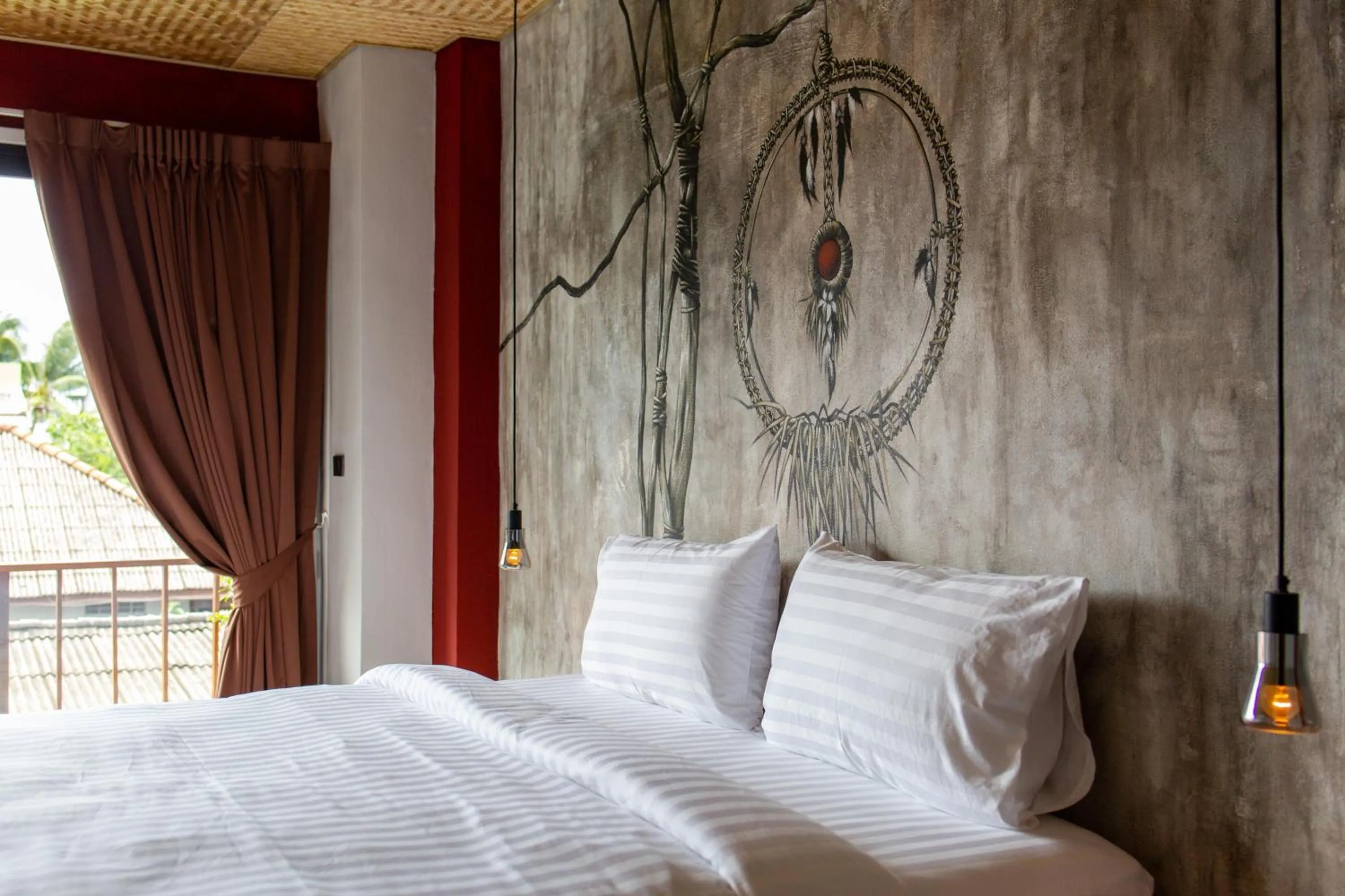 Bed in Dreamcatcher Boutique Hotel
