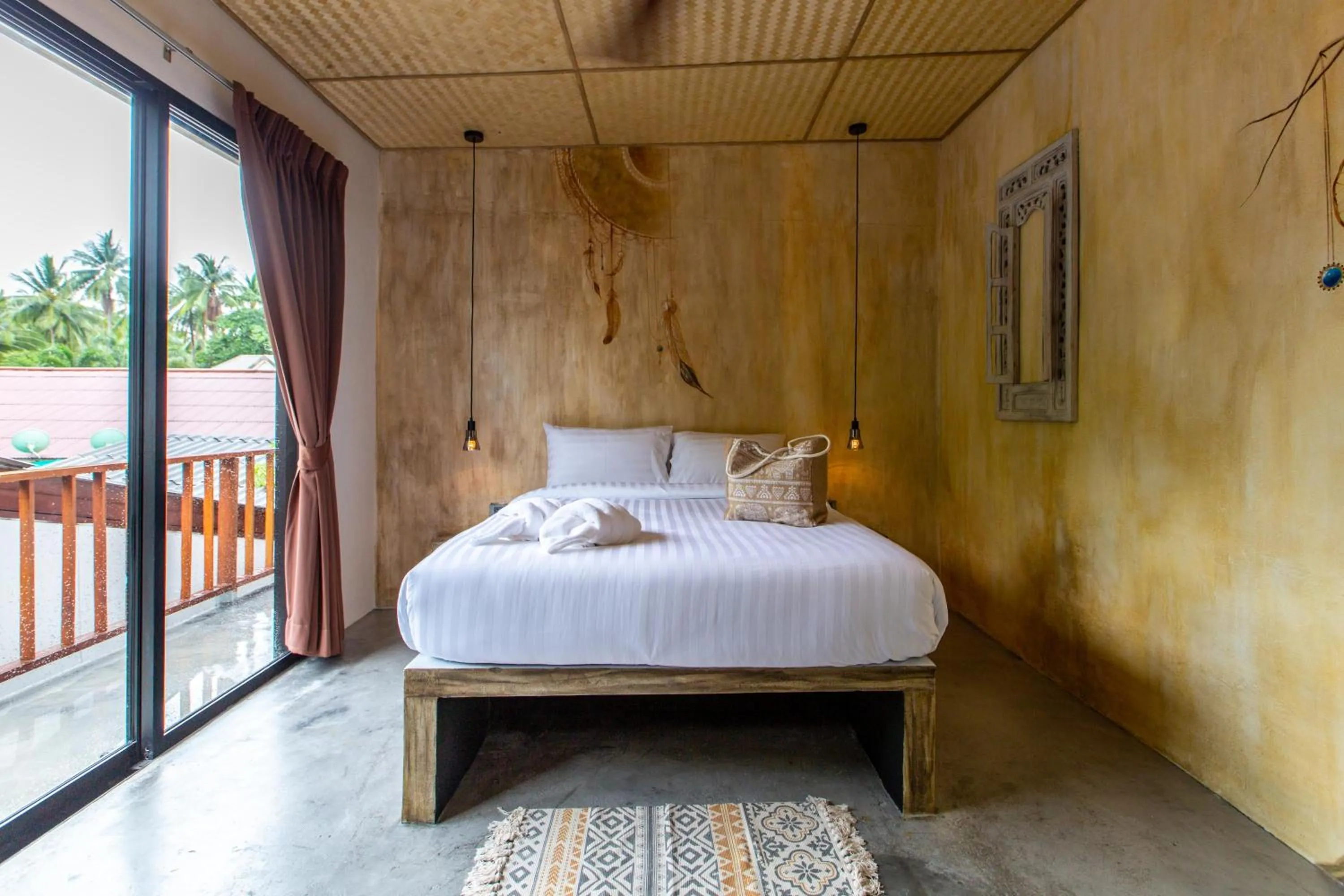 Bed in Dreamcatcher Boutique Hotel