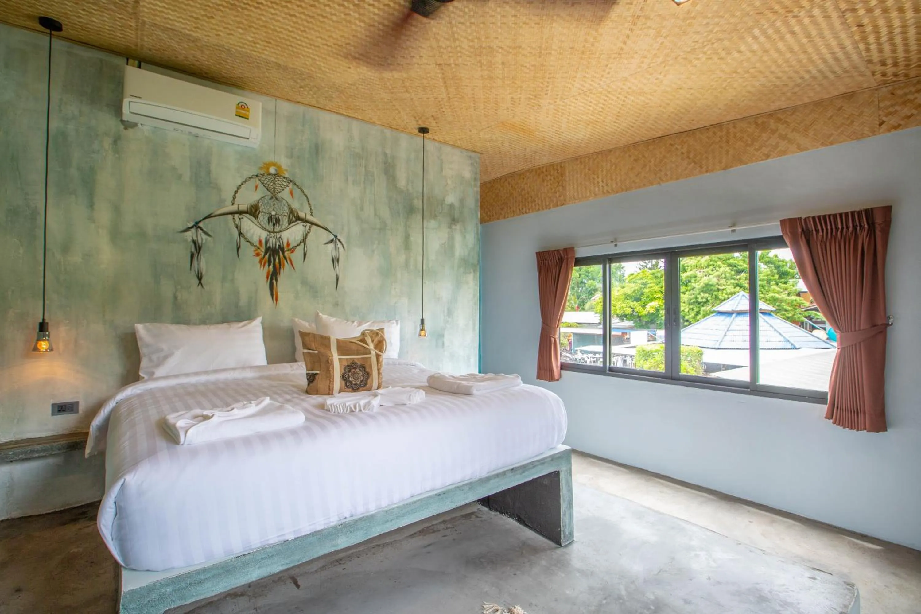 Bed in Dreamcatcher Boutique Hotel