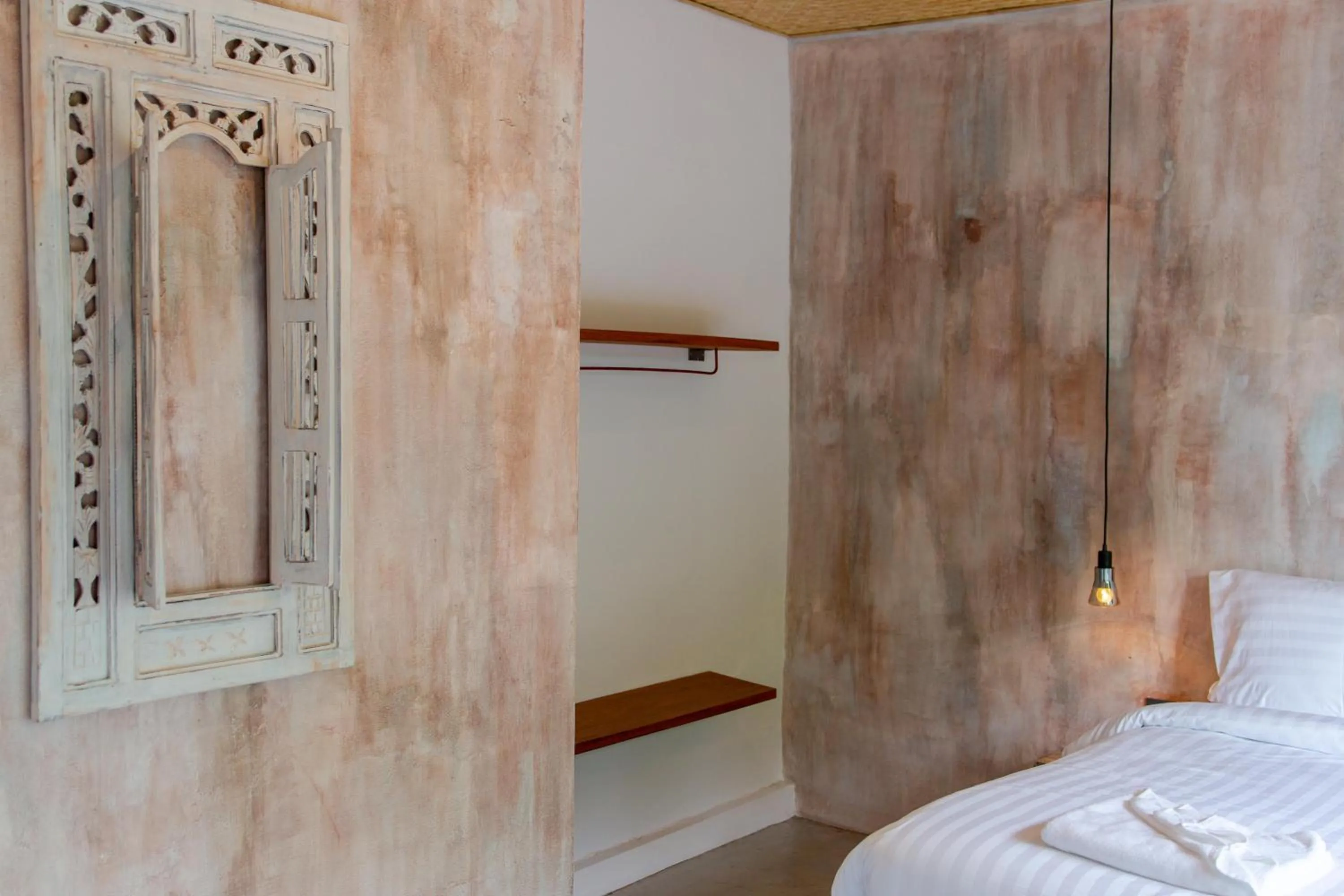 Bed in Dreamcatcher Boutique Hotel