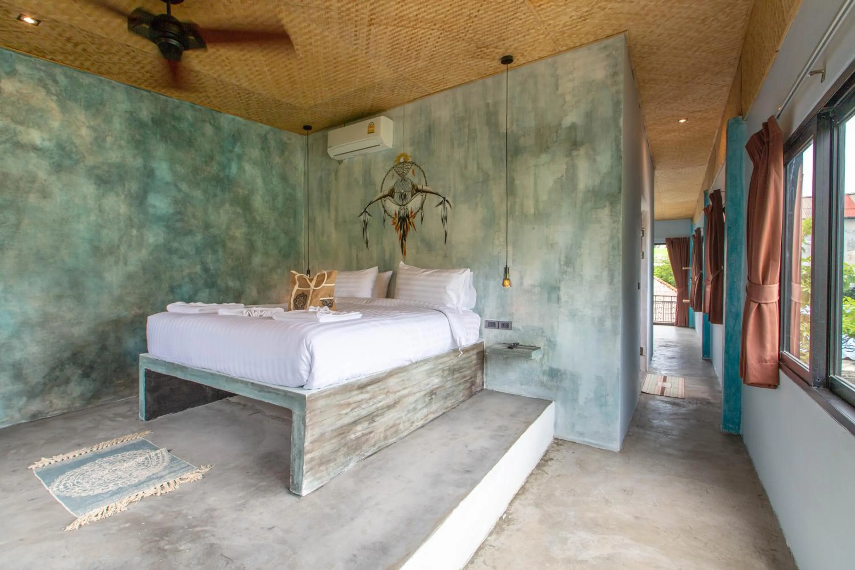 Bed in Dreamcatcher Boutique Hotel