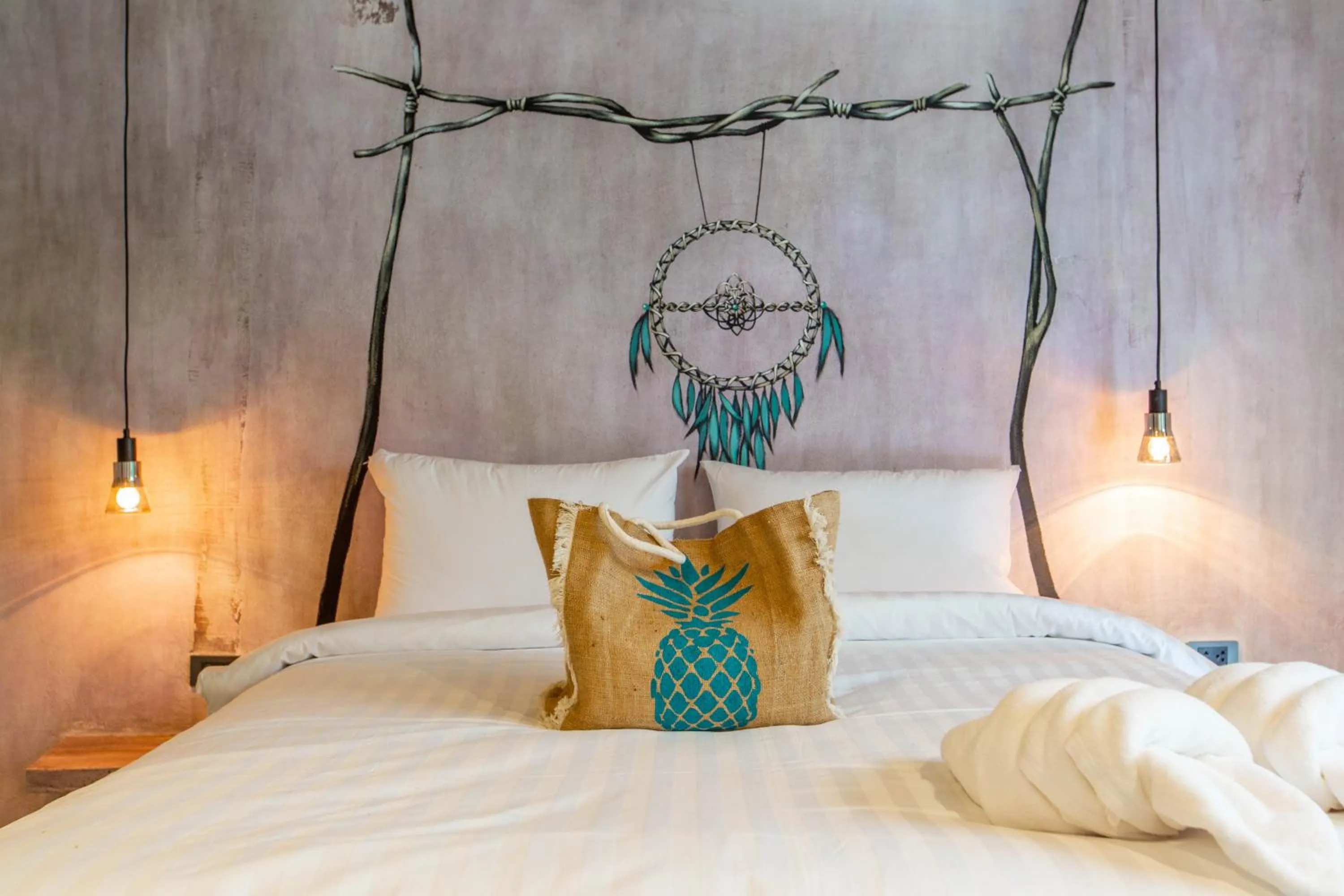 Bed in Dreamcatcher Boutique Hotel