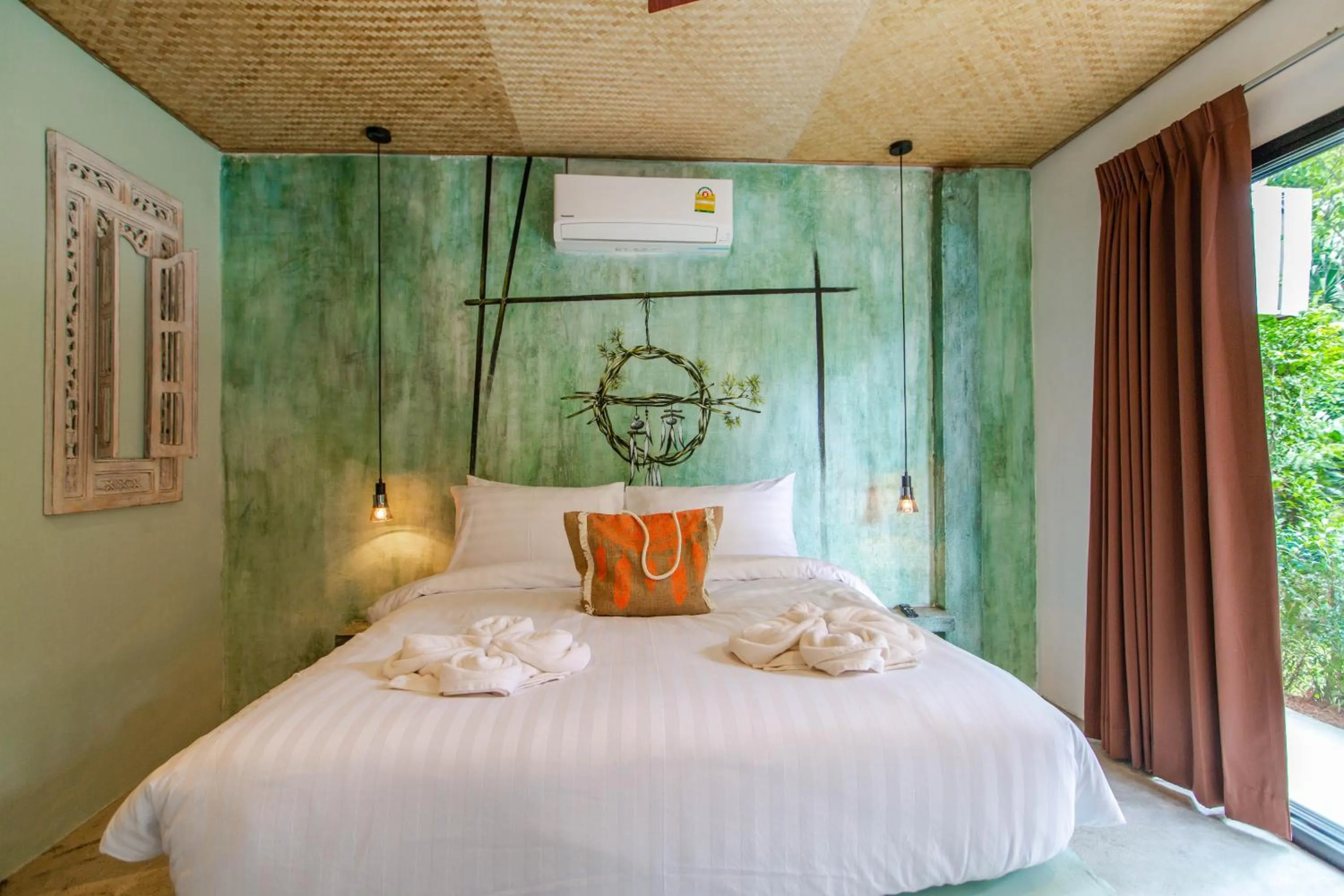 Bed in Dreamcatcher Boutique Hotel