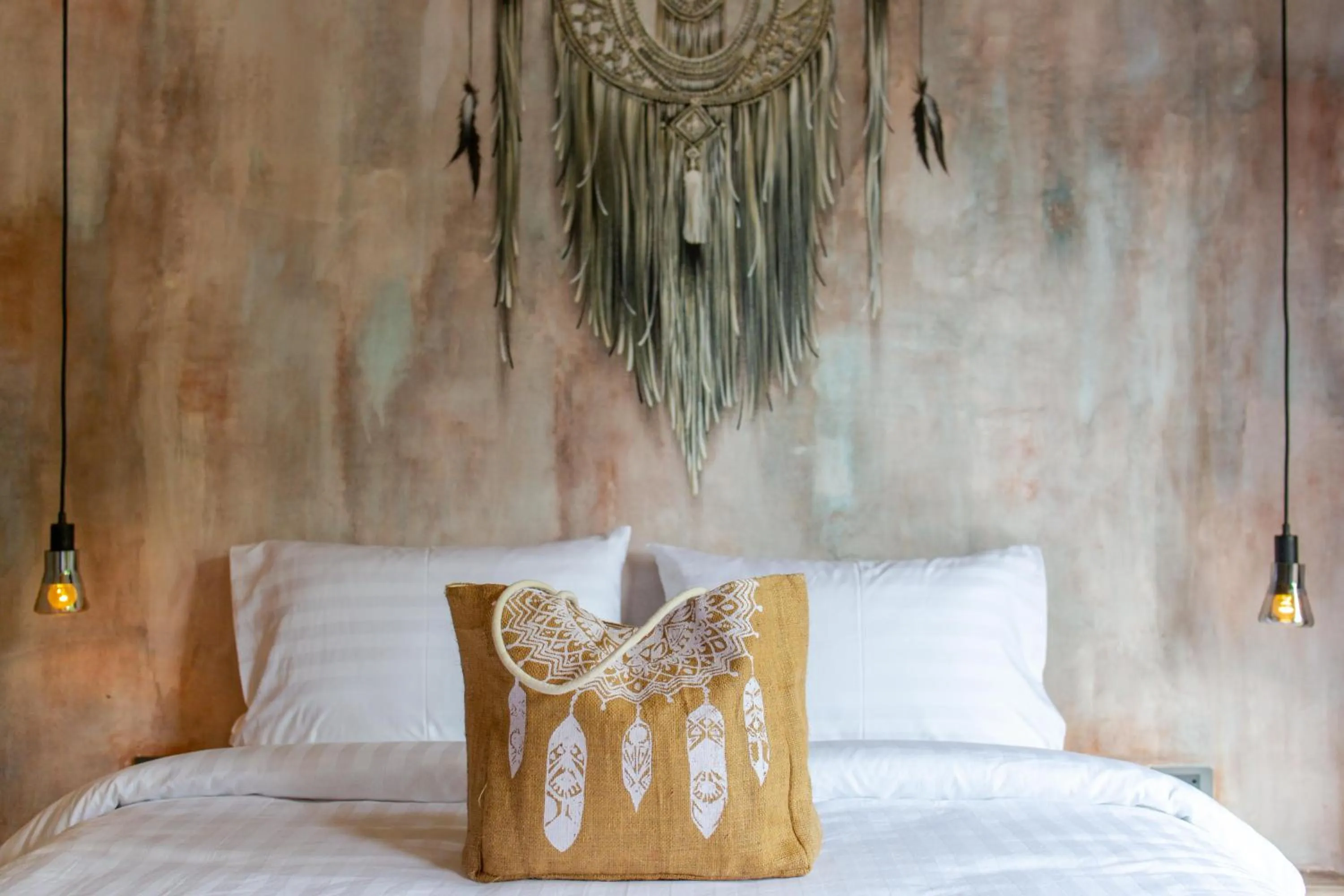 Bed in Dreamcatcher Boutique Hotel