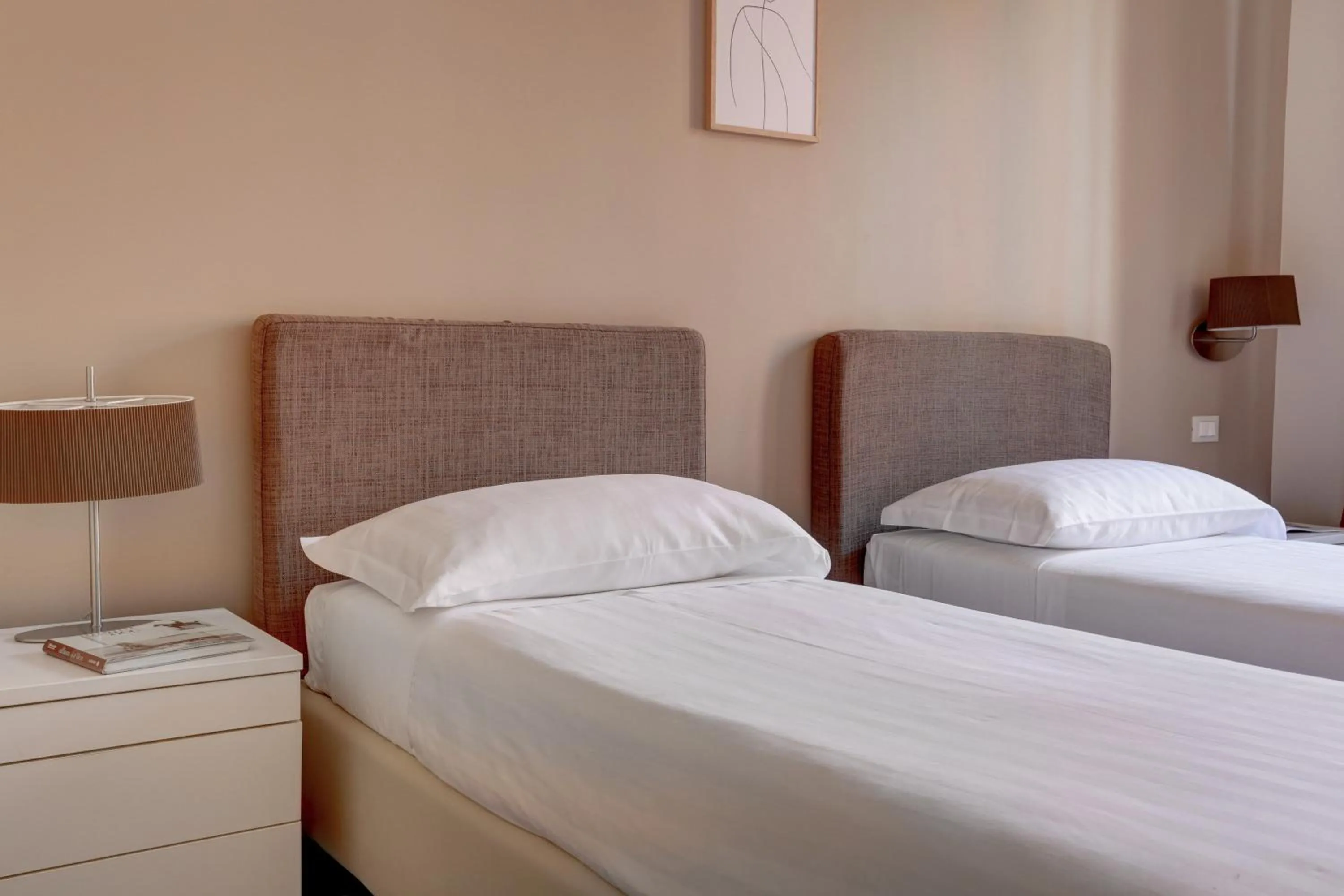 Bed in Colosseo Gardens - My Extra Home