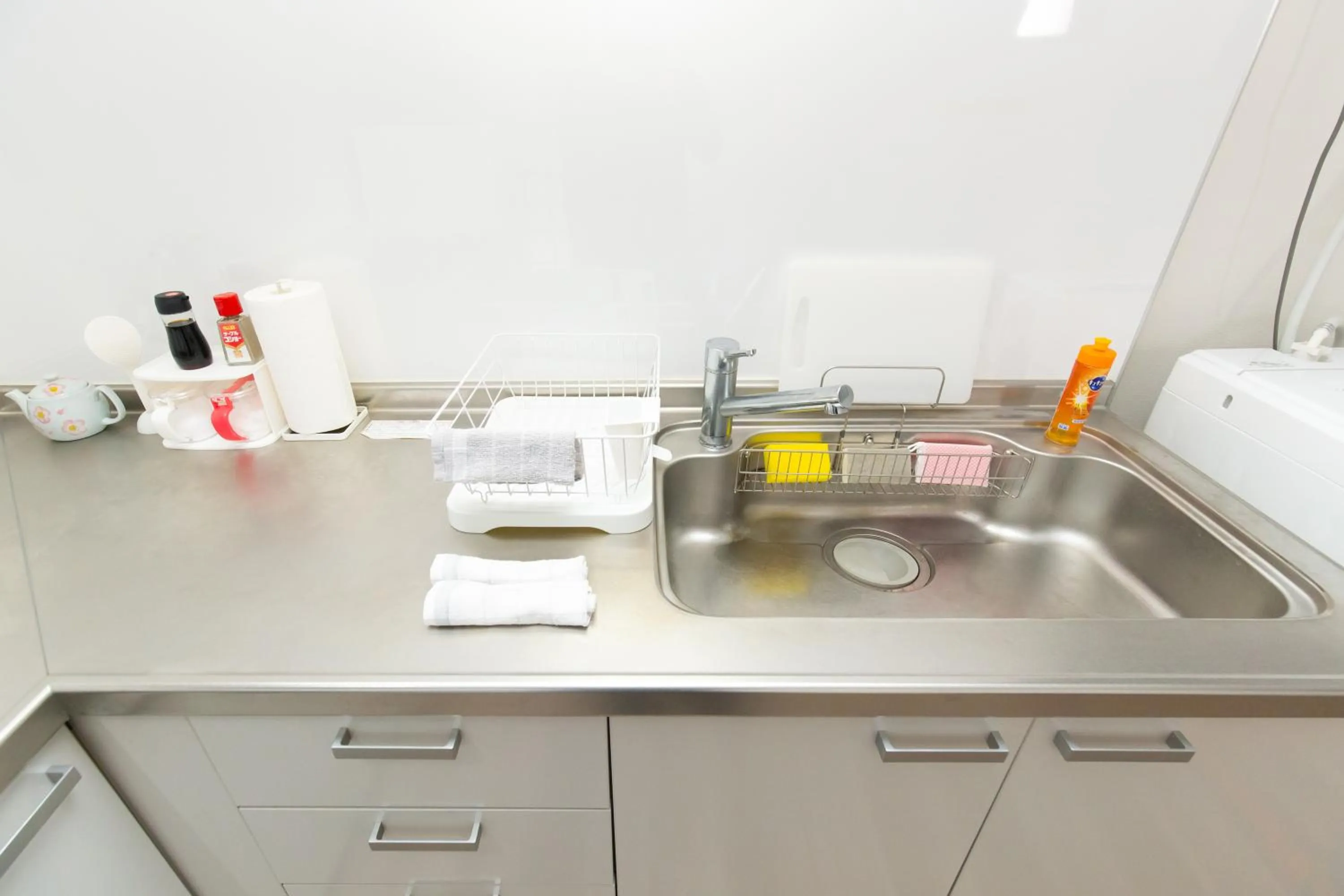 Kitchen or kitchenette in soleil Universal Fukushima Noda -vacation rental-