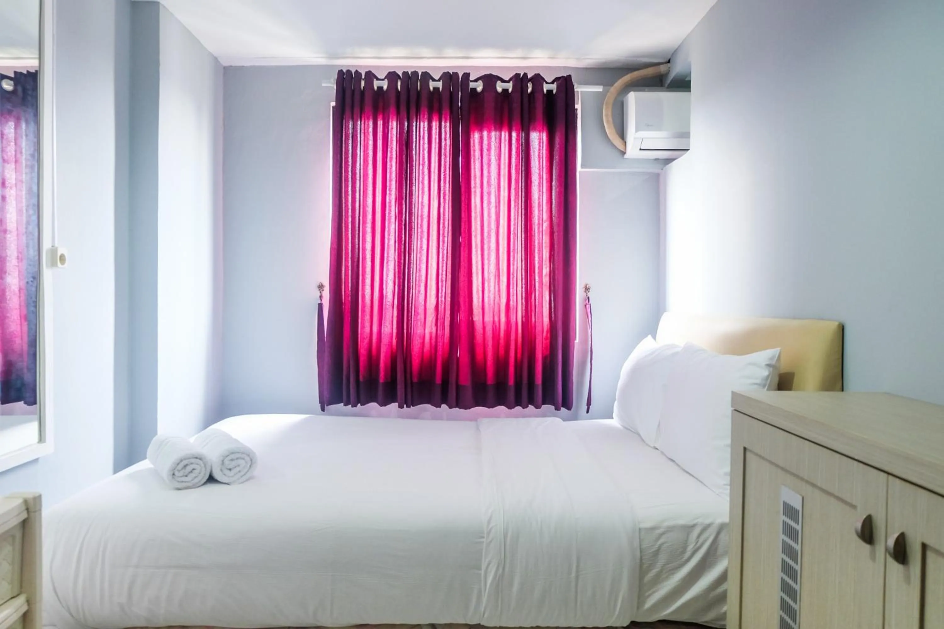 Bed in Best Price and Minimalist 2BR Kebagusan City Apartment By Travelio