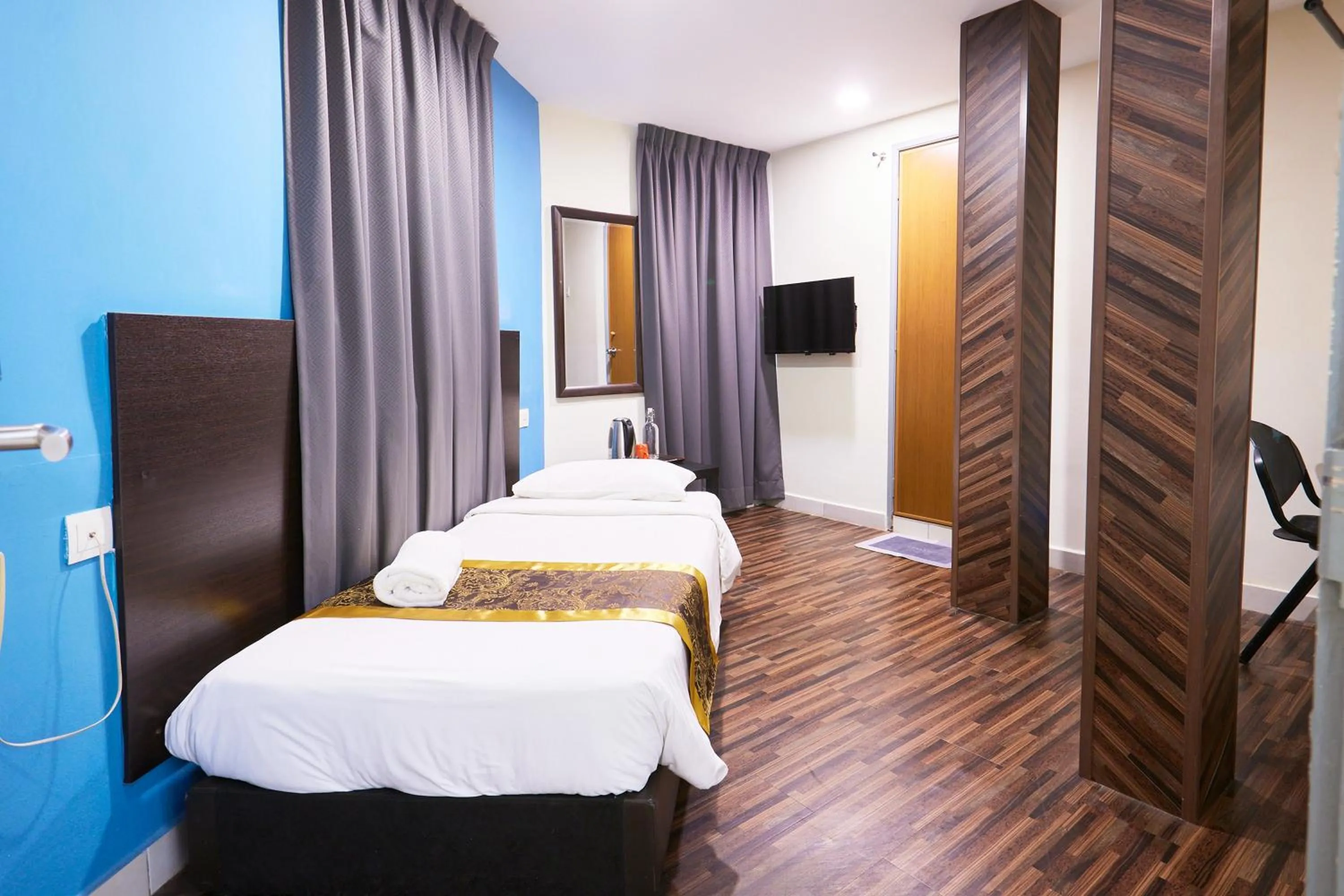 Bed in Hotel Sunjoy9 OKR