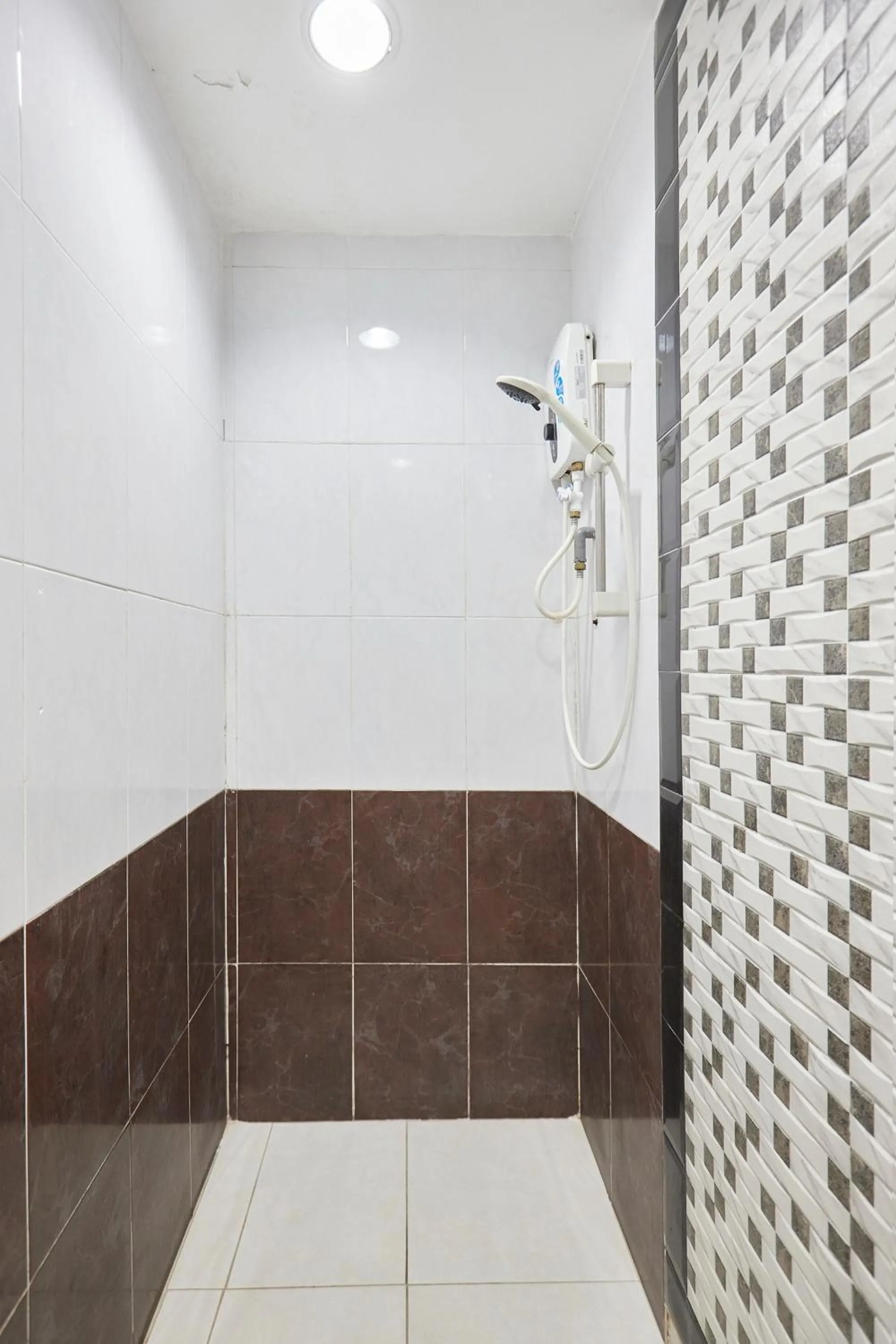 Bathroom in Hotel Sunjoy9 OKR