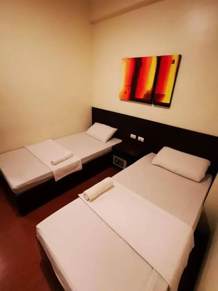 Bed in Orchard Hotel Davao Bed in Orchard Hotel Davao