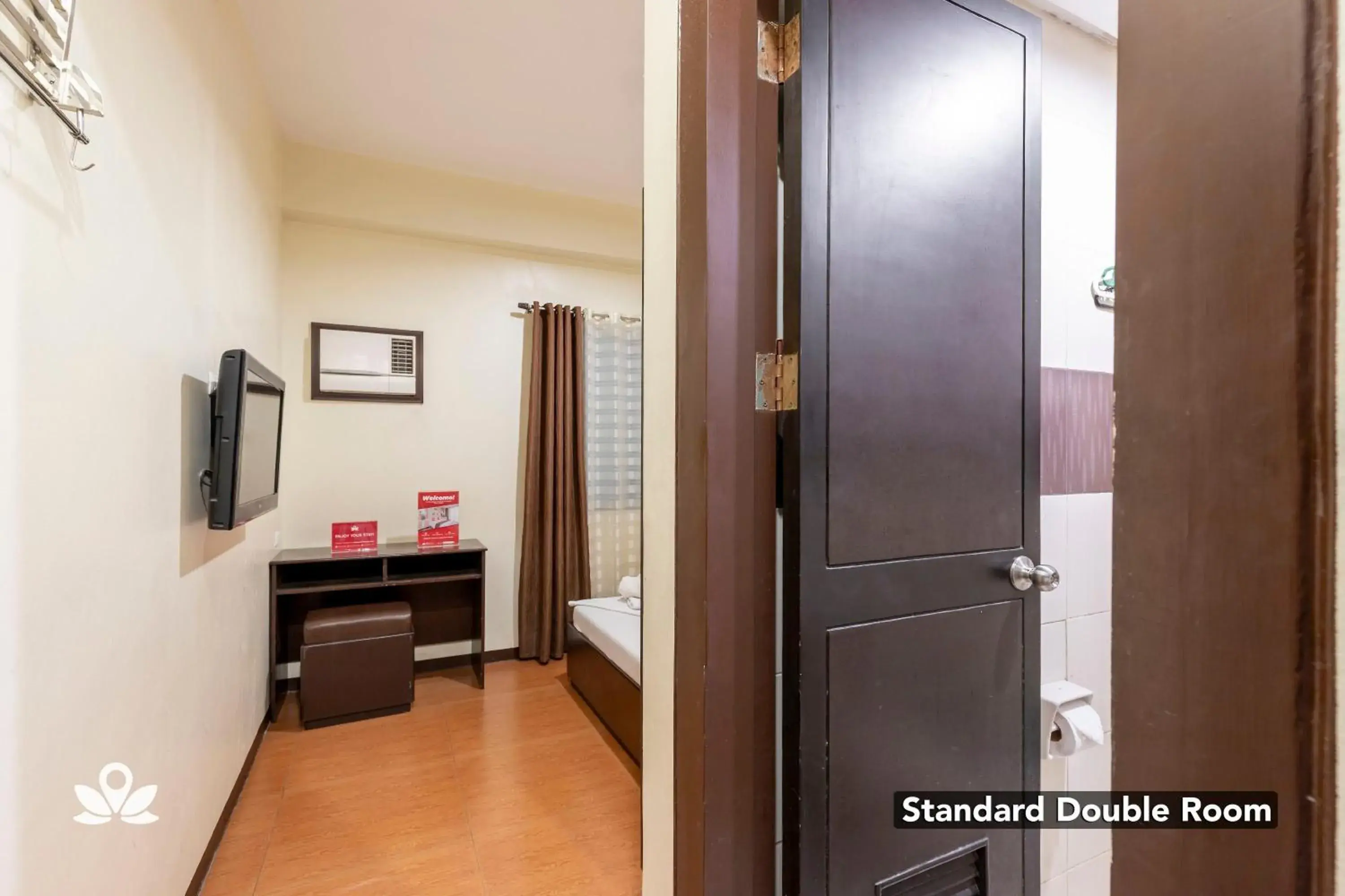 Bedroom in Orchard Hotel Davao Bedroom in Orchard Hotel Davao