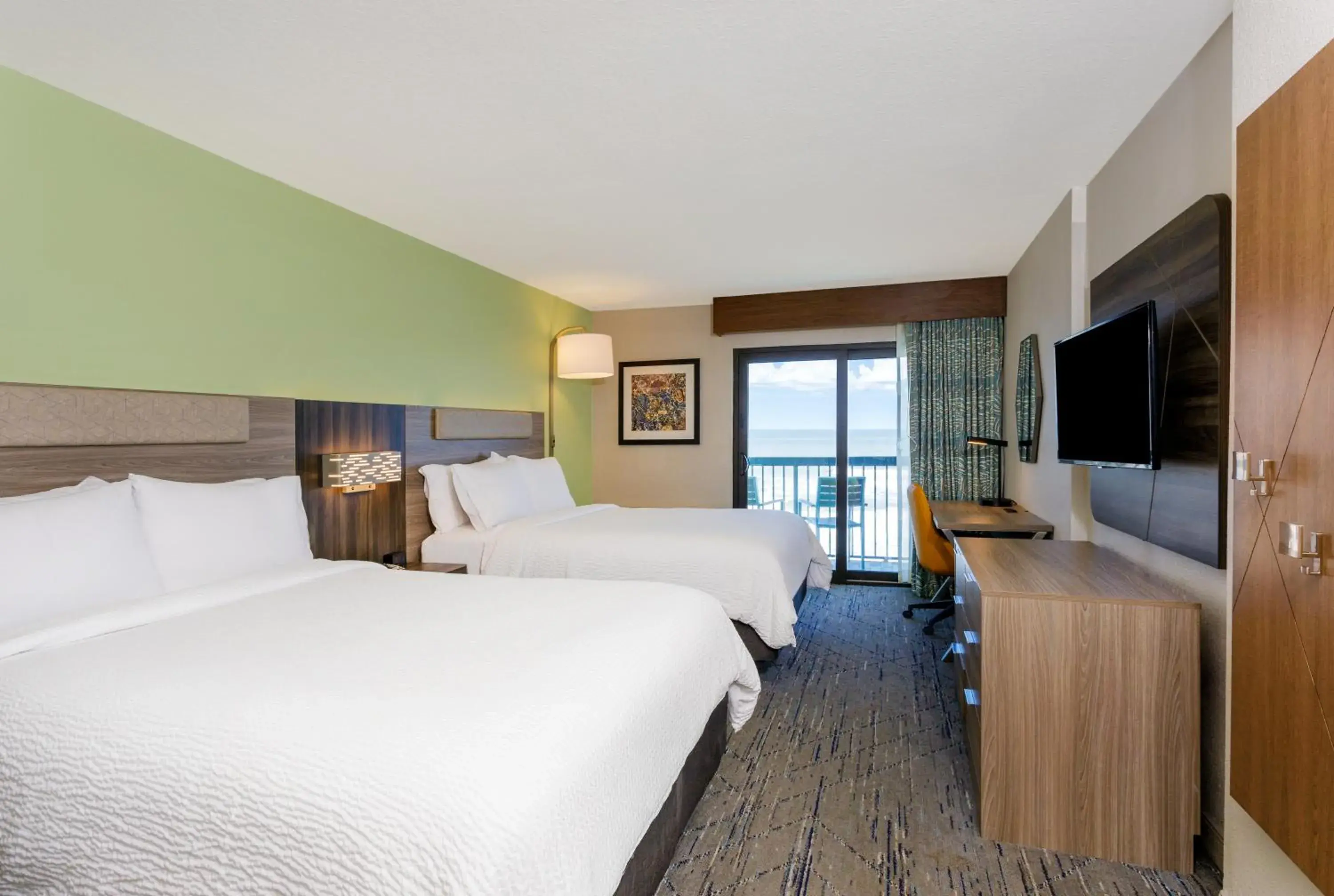 Bedroom, Bed in Holiday Inn Express & Suites Oceanfront Daytona Beach Shores by IHG Bedroom, Bed in Holiday Inn Express & Suites Oceanfront Daytona Beach Shores by IHG