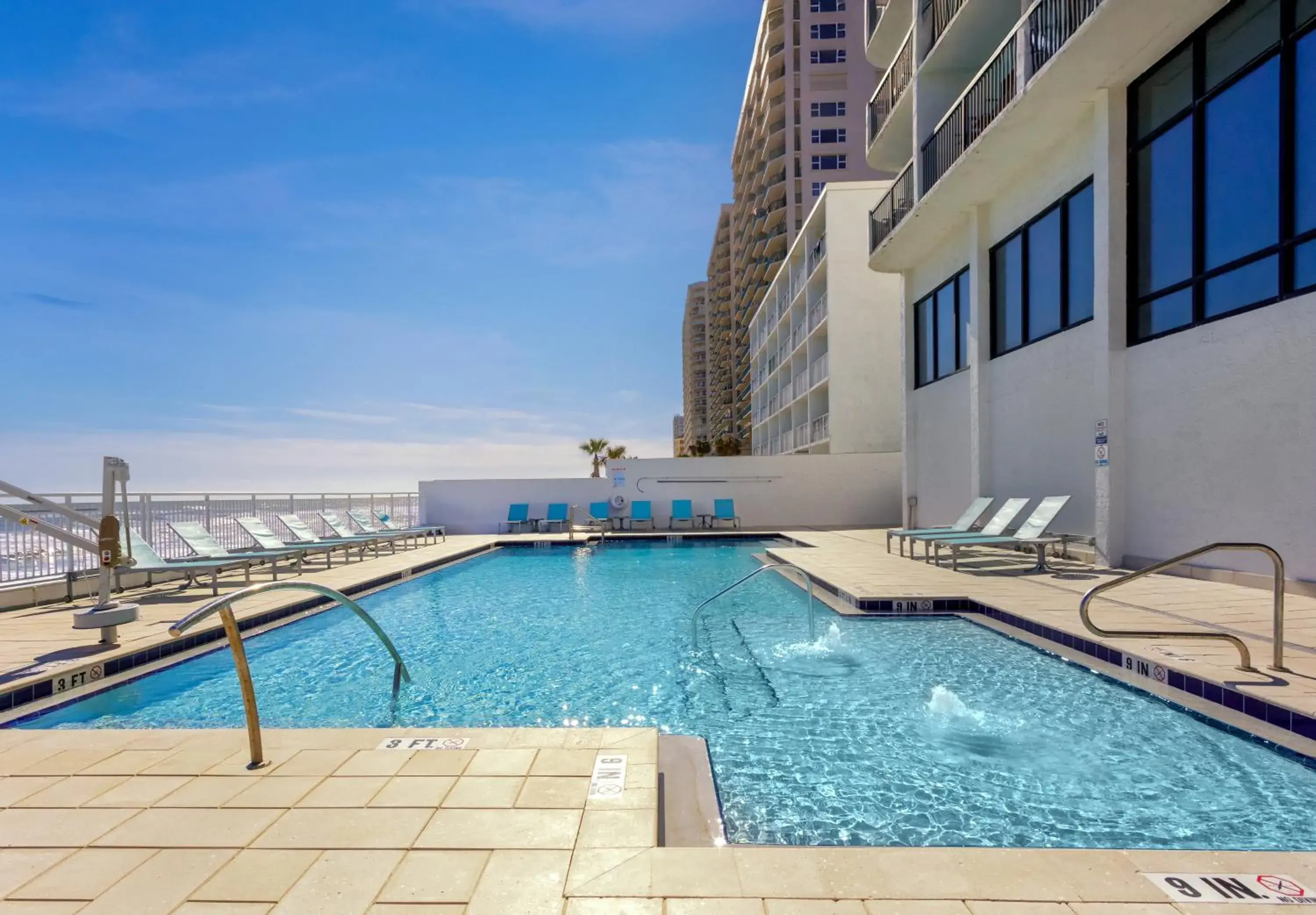Pool view in Holiday Inn Express & Suites Oceanfront Daytona Beach Shores by IHG Pool view in Holiday Inn Express & Suites Oceanfront Daytona Beach Shores by IHG